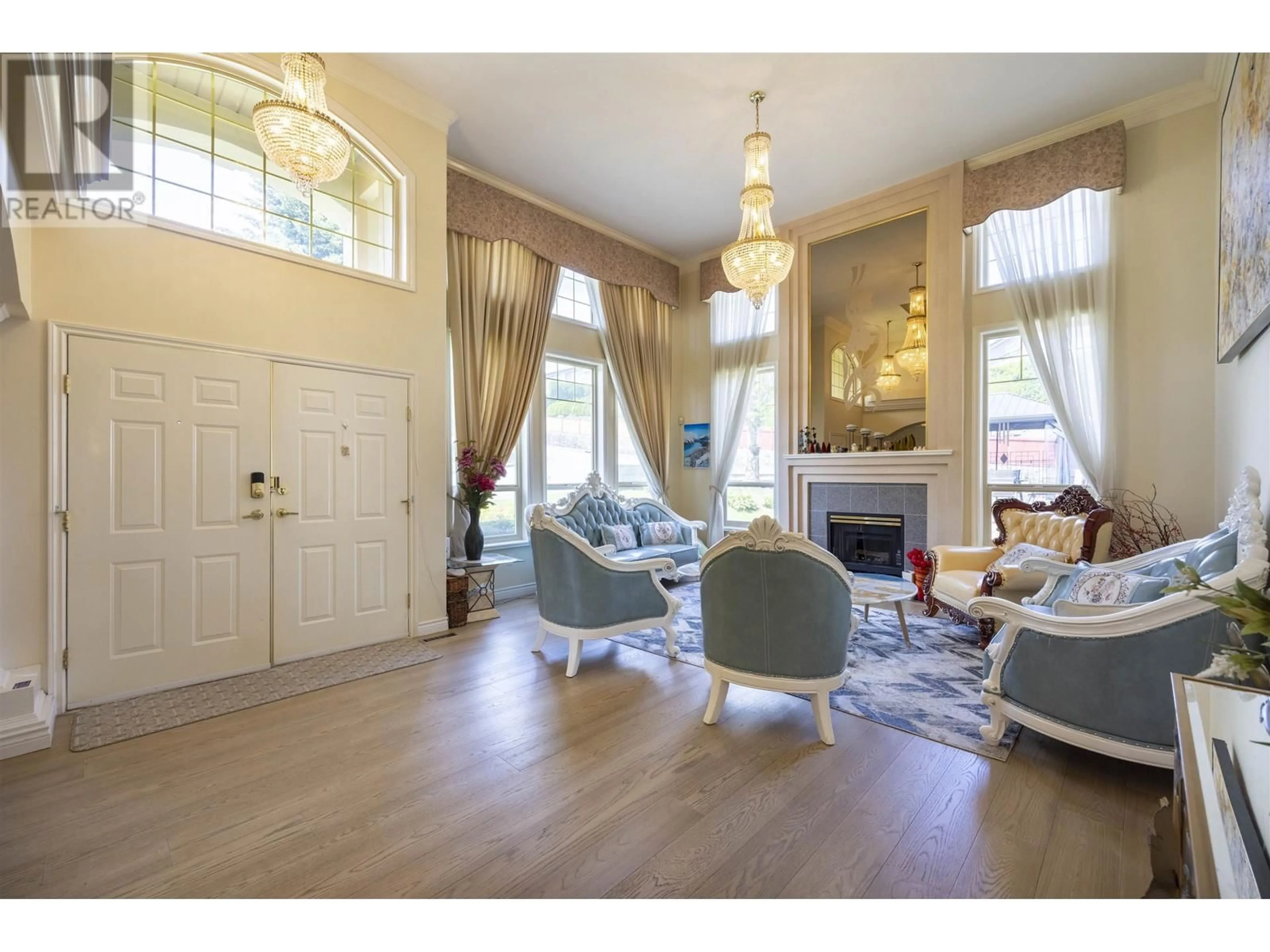 Living room with furniture, wood/laminate floor for 3080 CARDINAL COURT, Coquitlam British Columbia V3E3C4