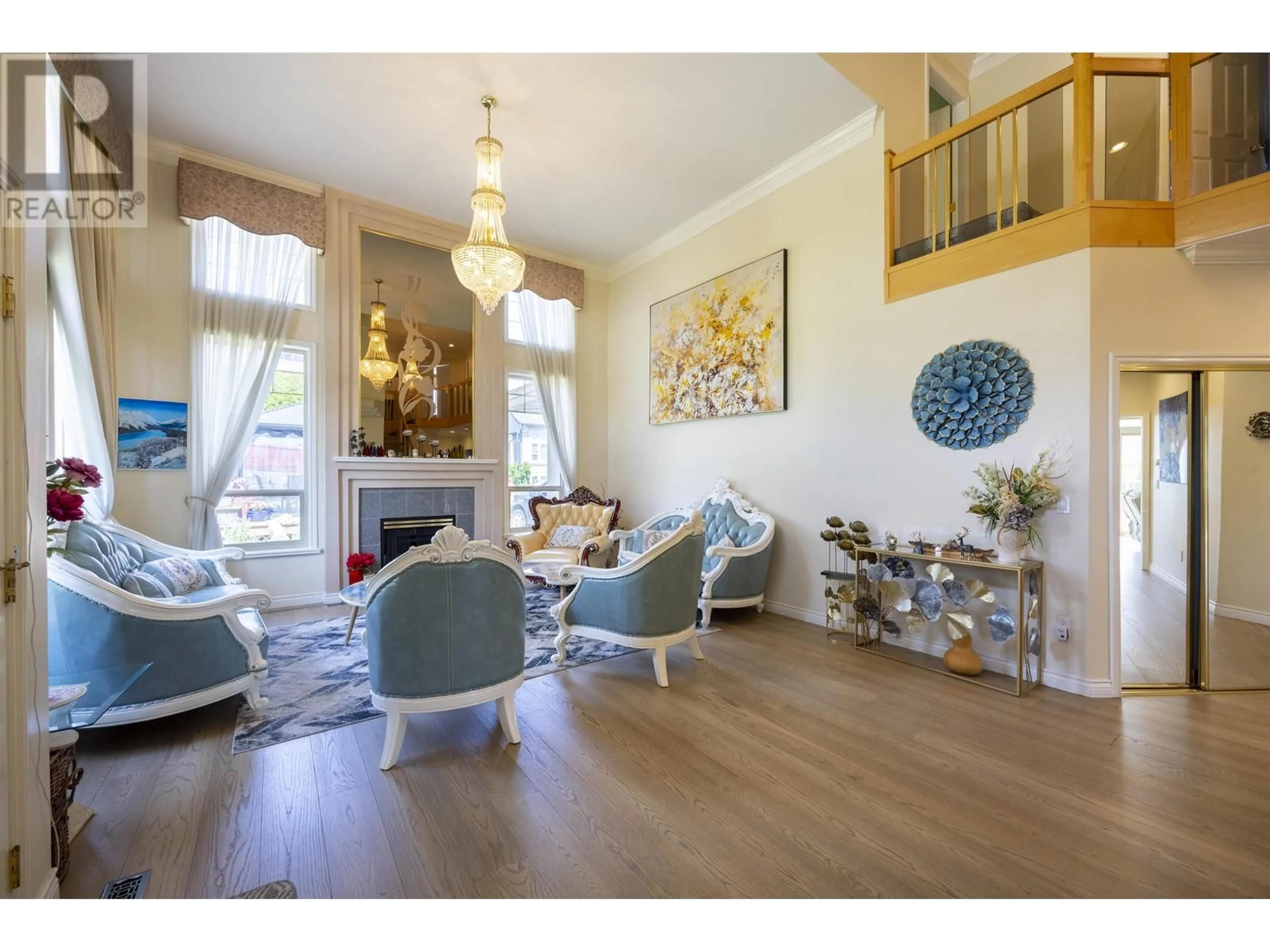 Living room with furniture, wood/laminate floor for 3080 CARDINAL COURT, Coquitlam British Columbia V3E3C4