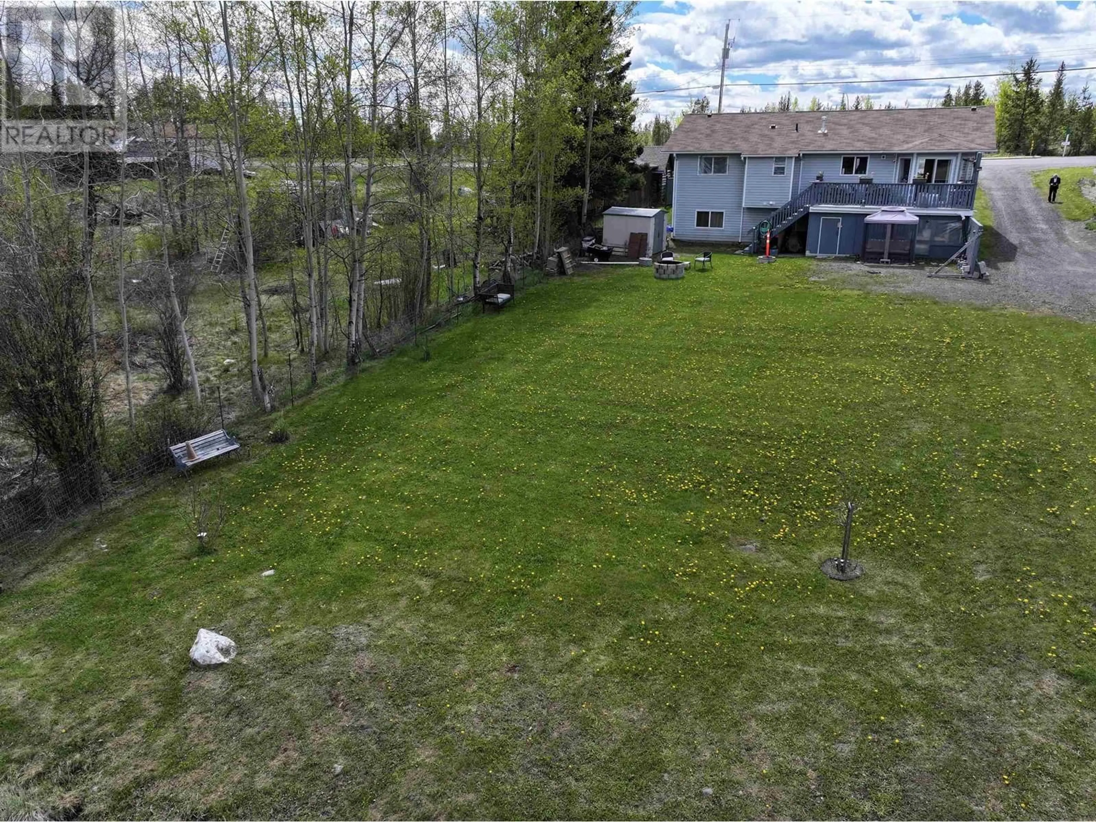 A pic from outside/outdoor area/front of a property/back of a property/a pic from drone, unknown for 7036 93 MILE FRONTAGE ROAD, 100 Mile House British Columbia V0K2E2