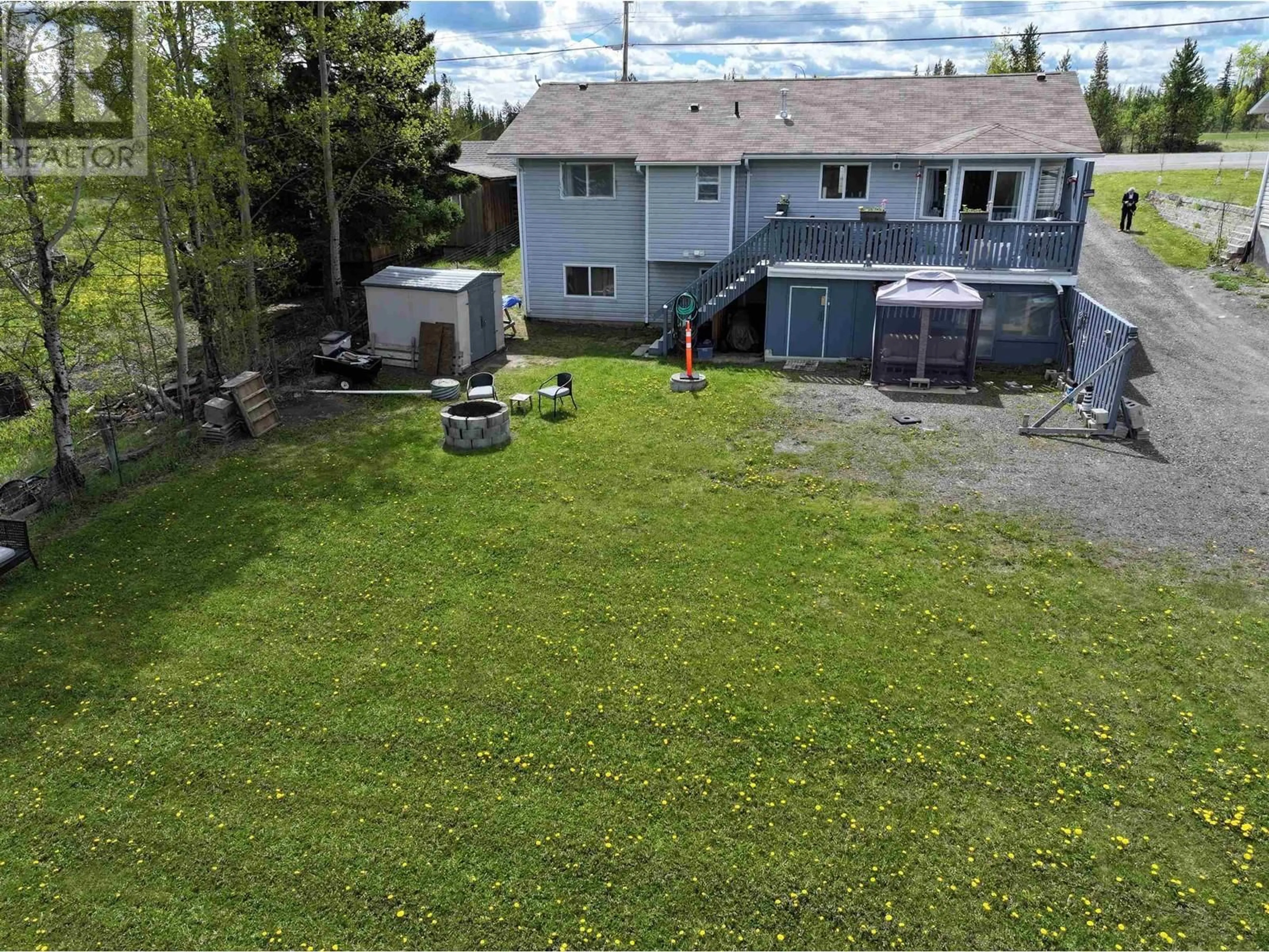 A pic from outside/outdoor area/front of a property/back of a property/a pic from drone, unknown for 7036 93 MILE FRONTAGE ROAD, 100 Mile House British Columbia V0K2E2