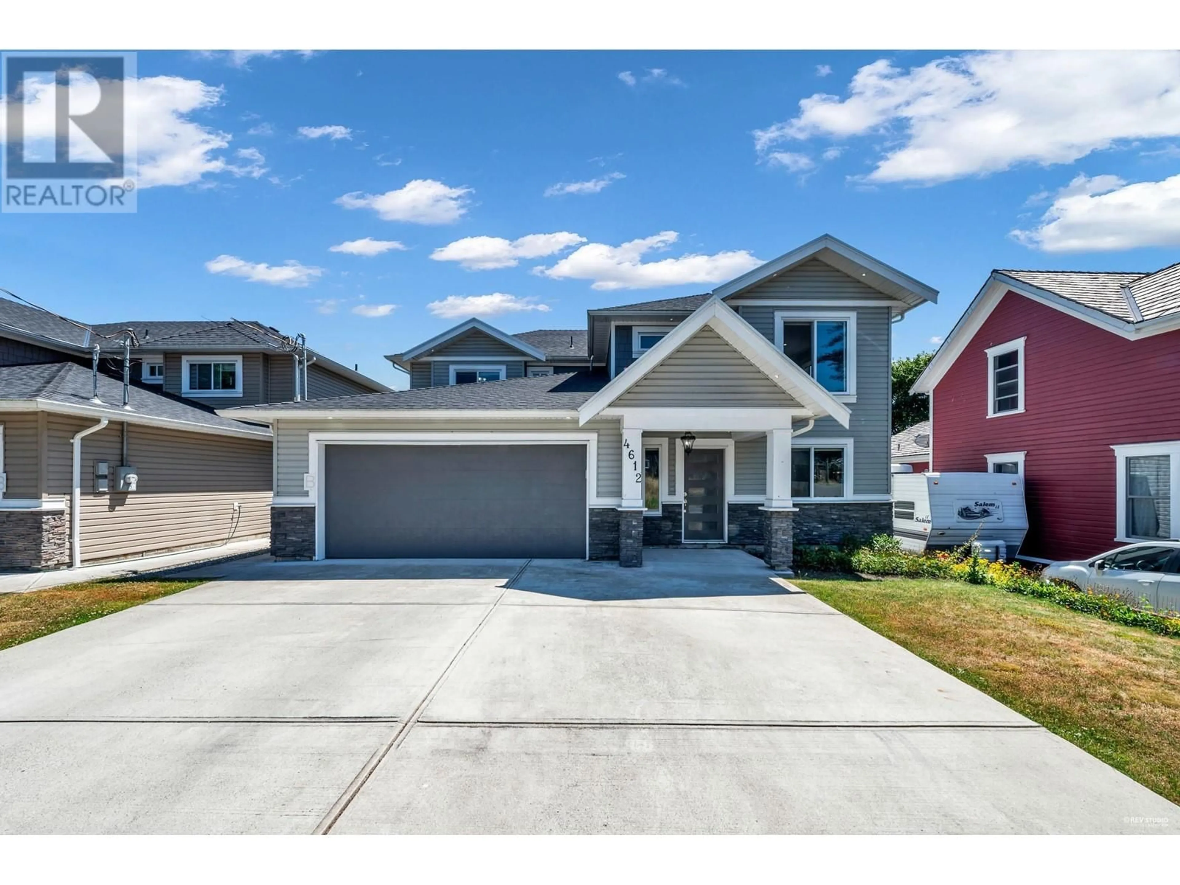 Home with vinyl exterior material, street for 4612 RIVER ROAD, Delta British Columbia V4K1S4