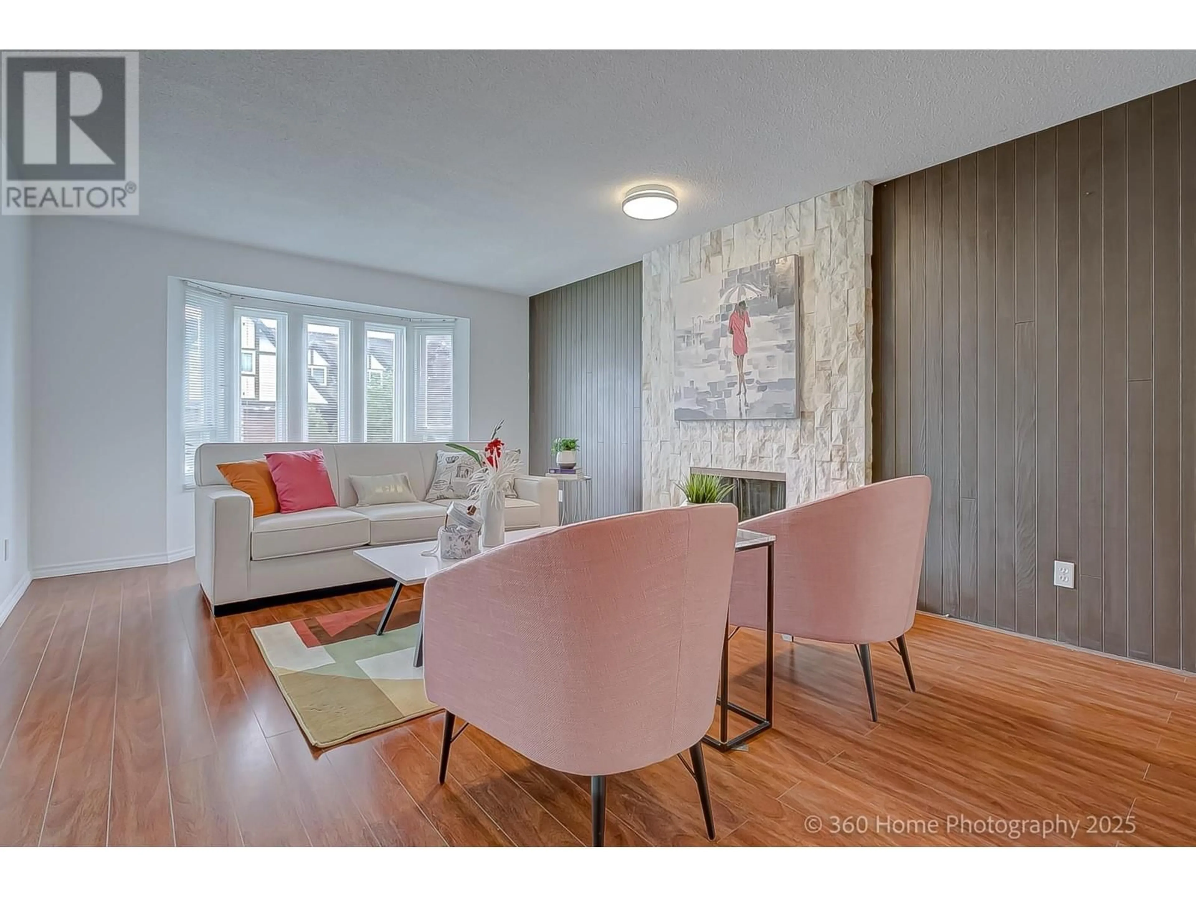 Living room with furniture, wood/laminate floor for 8711 DELAWARE ROAD, Richmond British Columbia V7C4X6