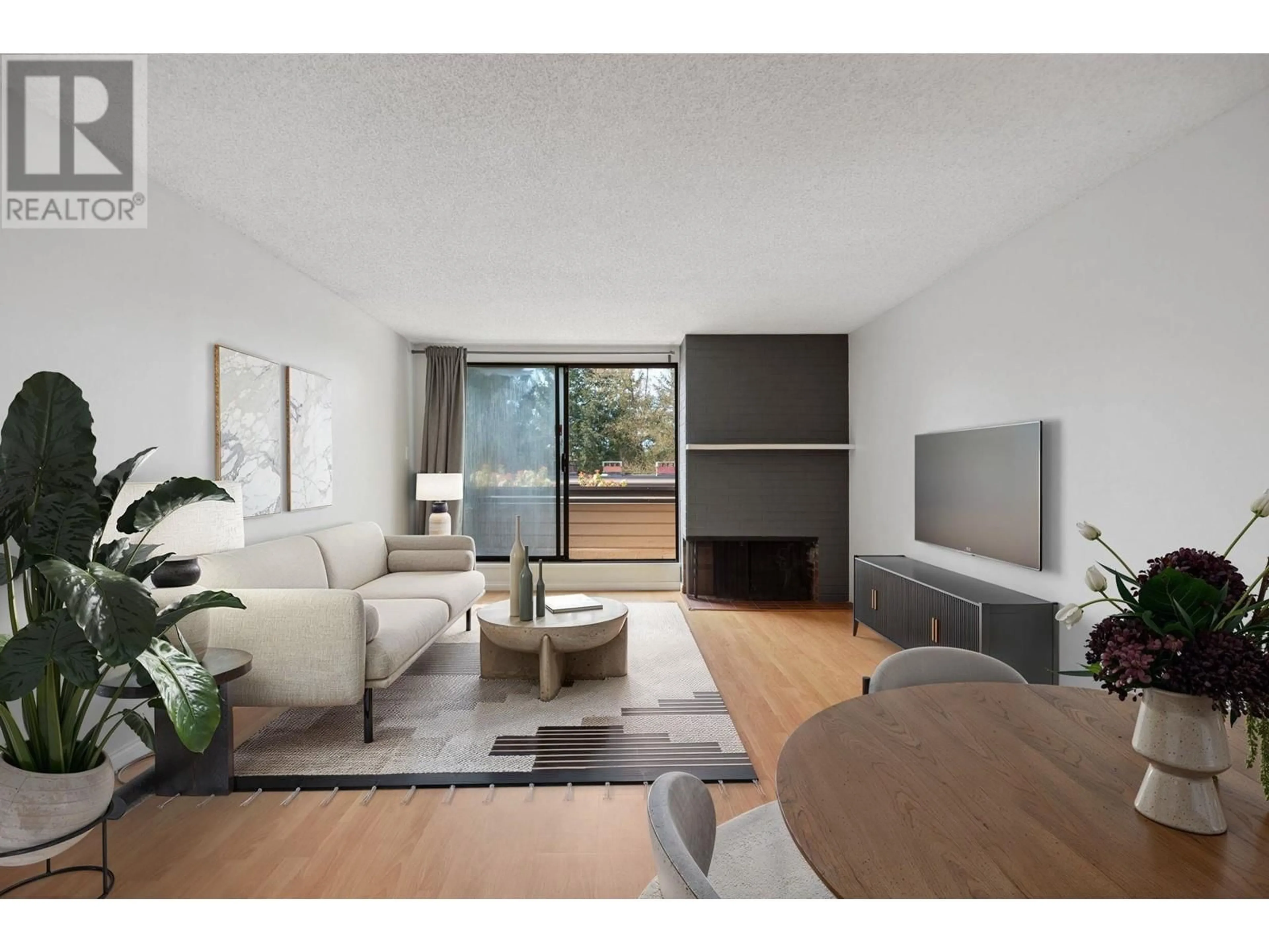 Living room with furniture, wood/laminate floor for 3961 SPRINGTREE DRIVE, Vancouver British Columbia V6L3E2