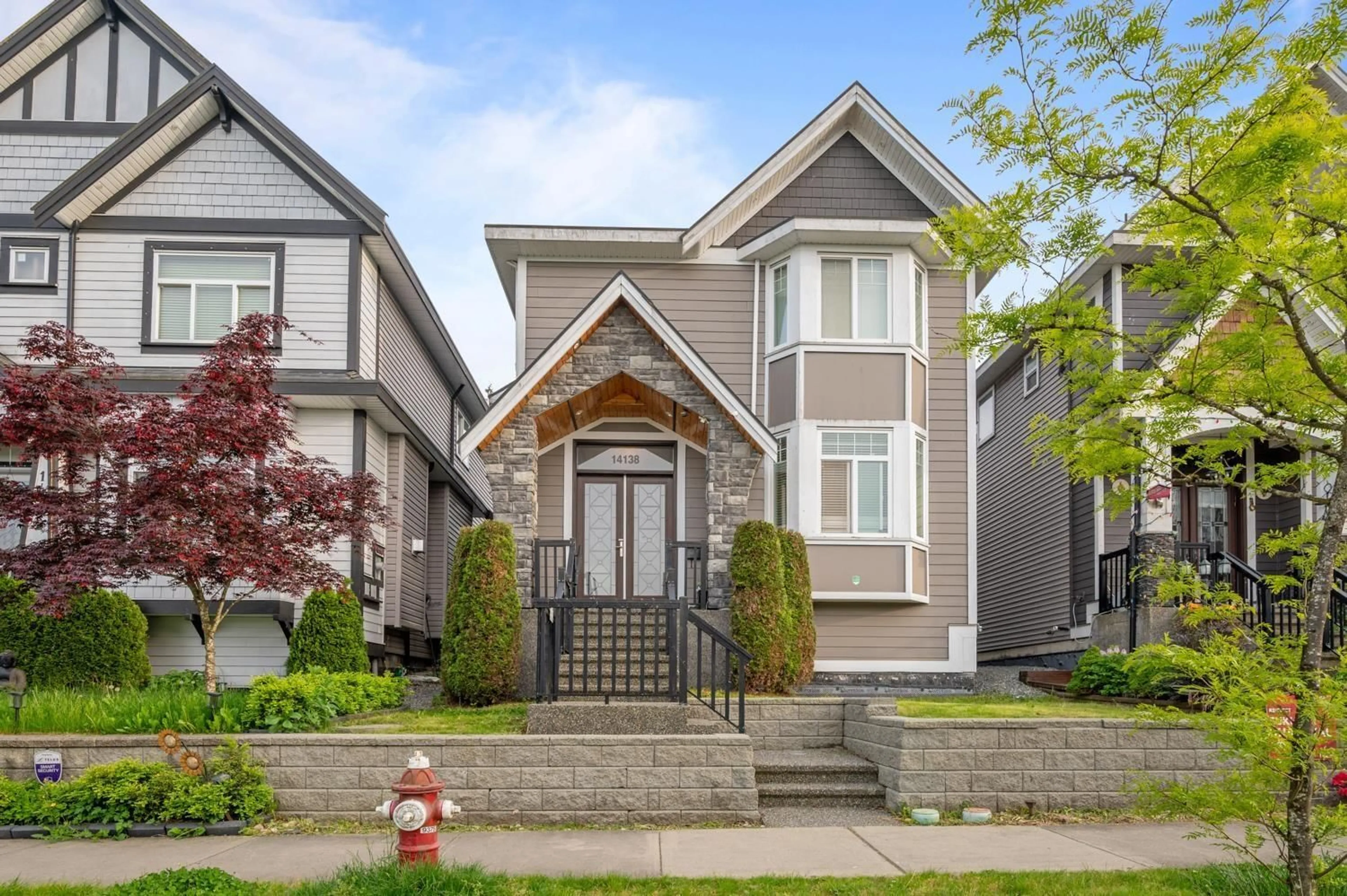 Home with vinyl exterior material, street for 14138 60A, Surrey British Columbia V3X0G1