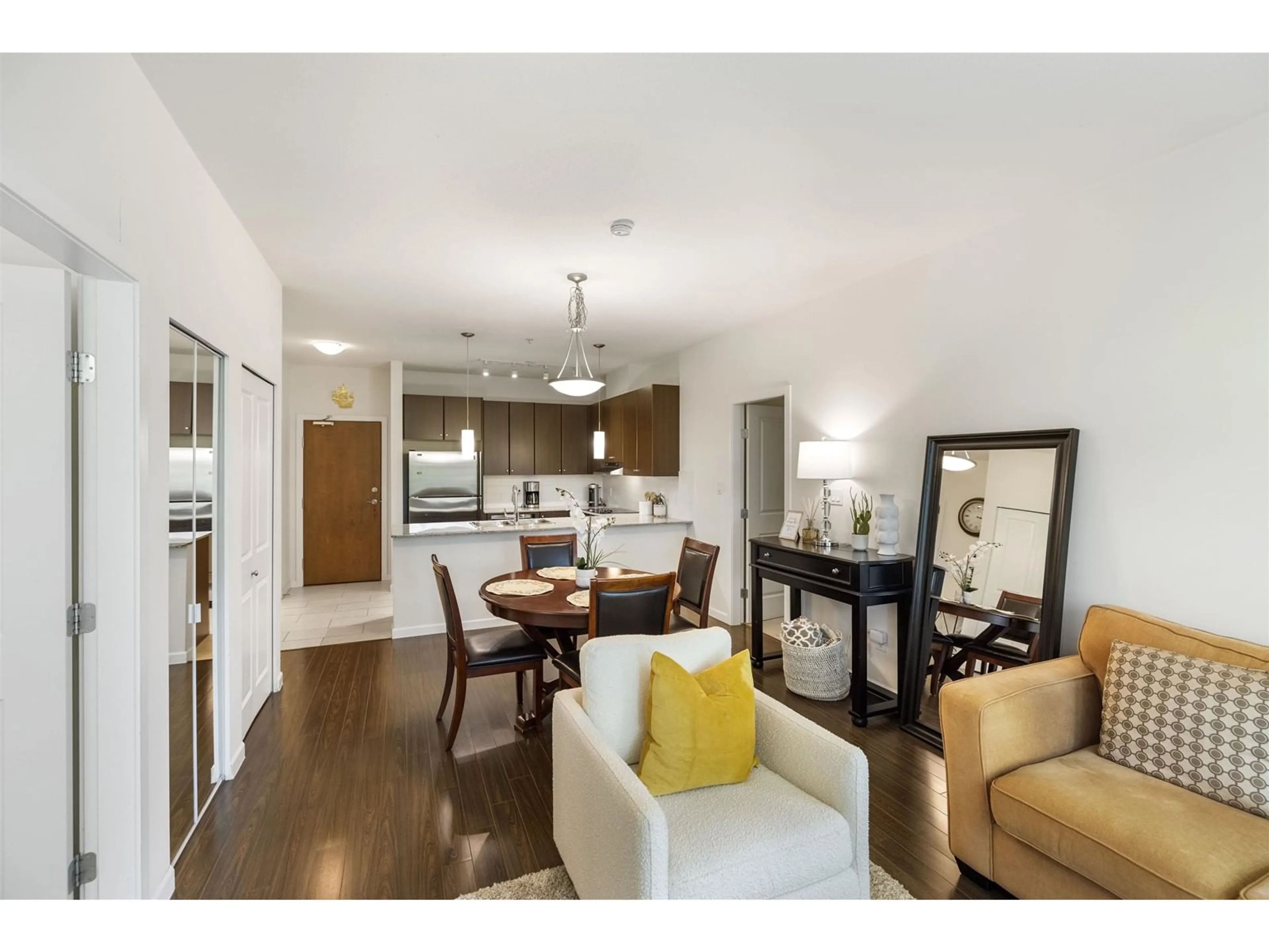 Open concept kitchen, wood/laminate floor for 312 - 15322 101, Surrey British Columbia V3R4G9