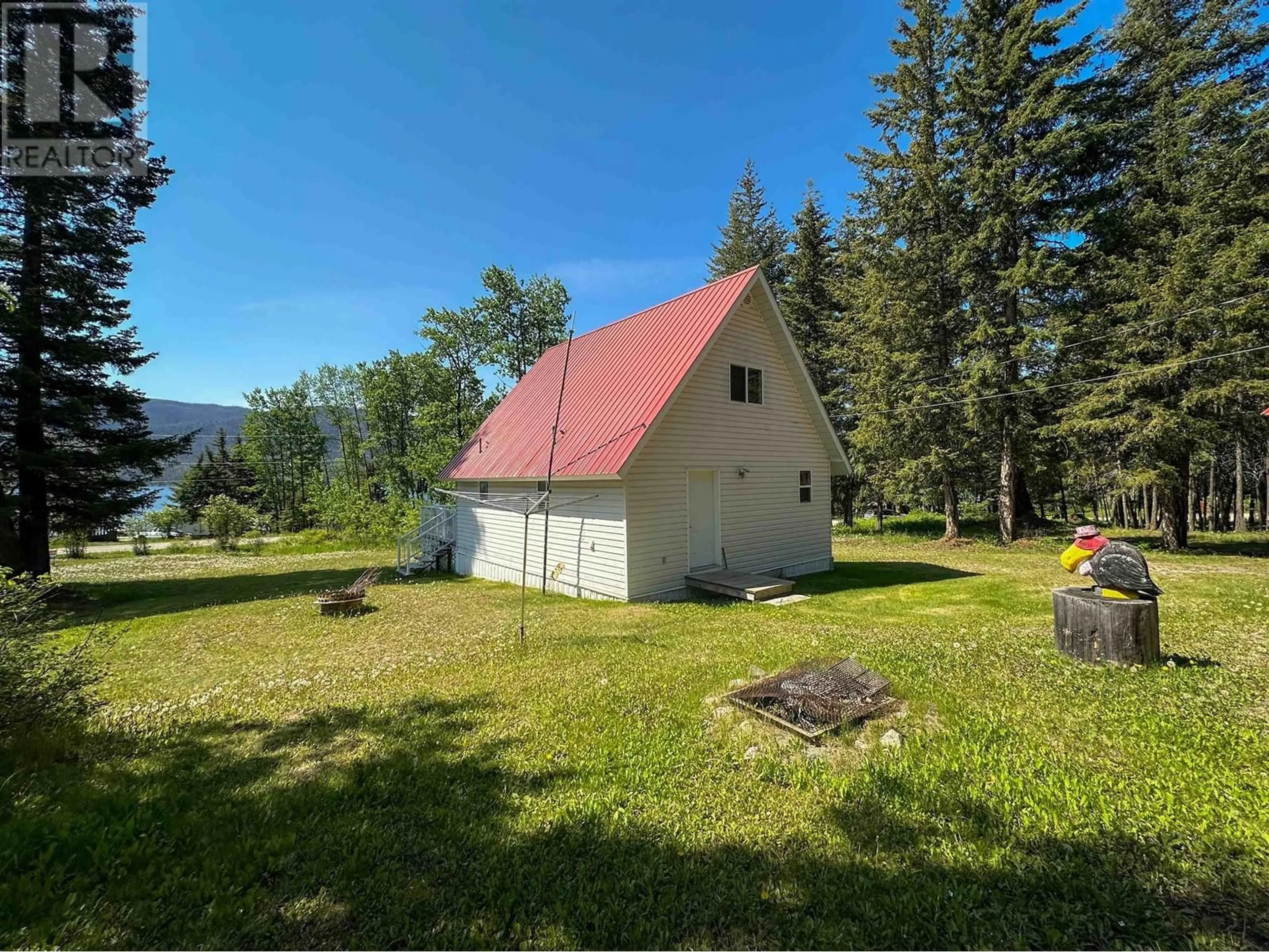 A pic from outside/outdoor area/front of a property/back of a property/a pic from drone, mountain view for 2800 FRANCOIS LAKE ROAD, Fraser Lake British Columbia V0J1S0