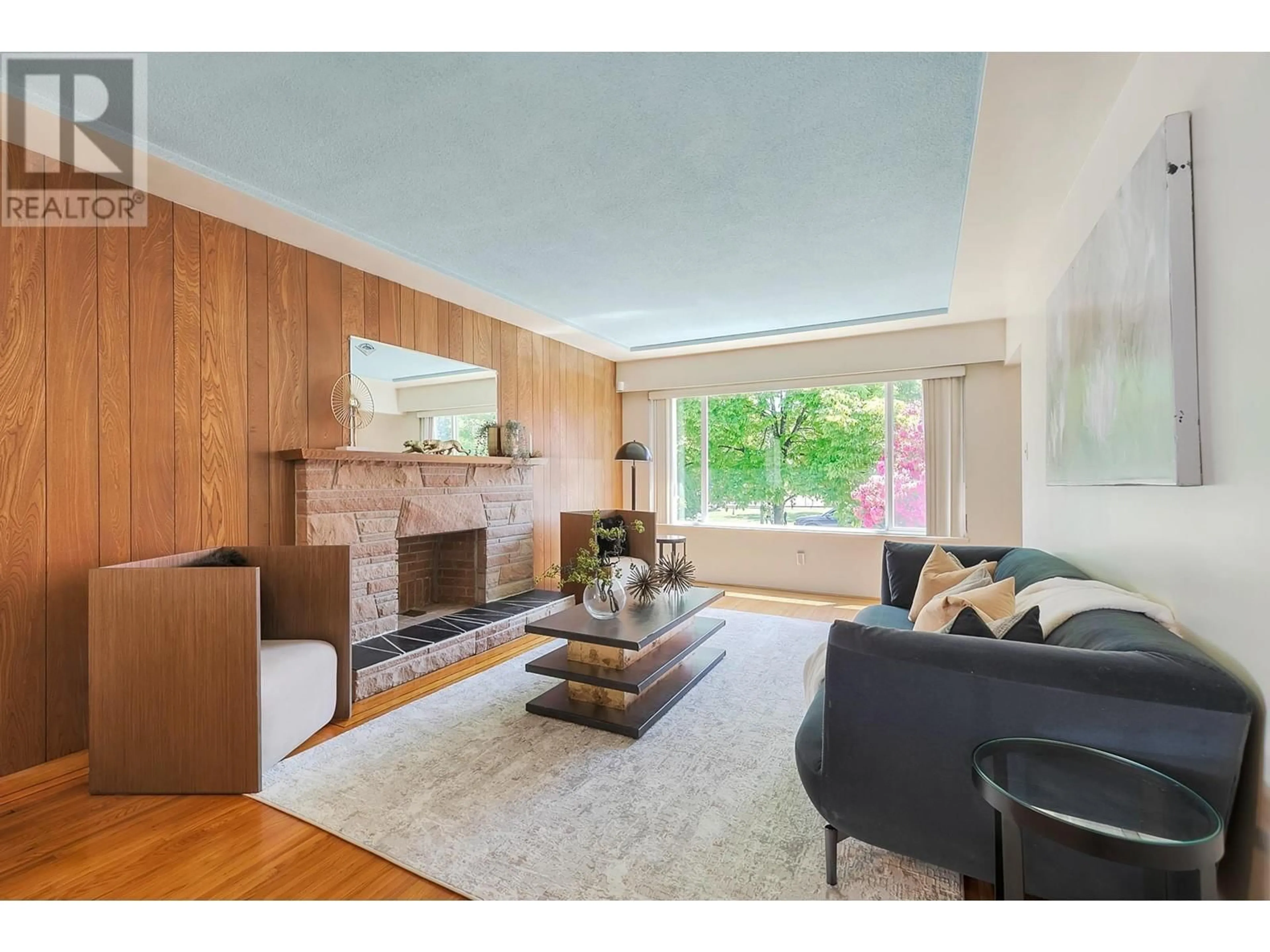 Living room with furniture, wood/laminate floor for 2331 46TH AVENUE, Vancouver British Columbia V5S1A1