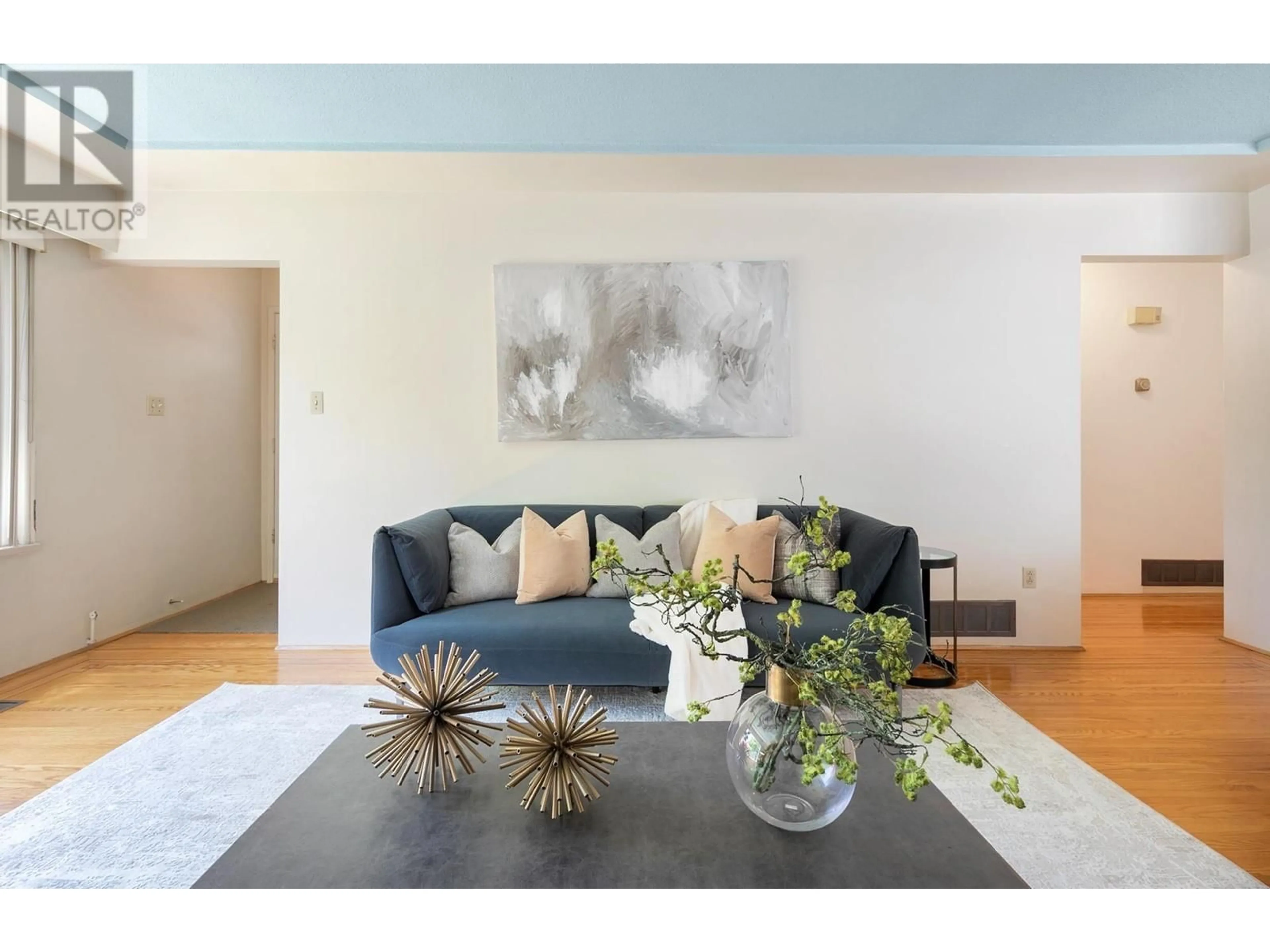 Living room with furniture, wood/laminate floor for 2331 46TH AVENUE, Vancouver British Columbia V5S1A1