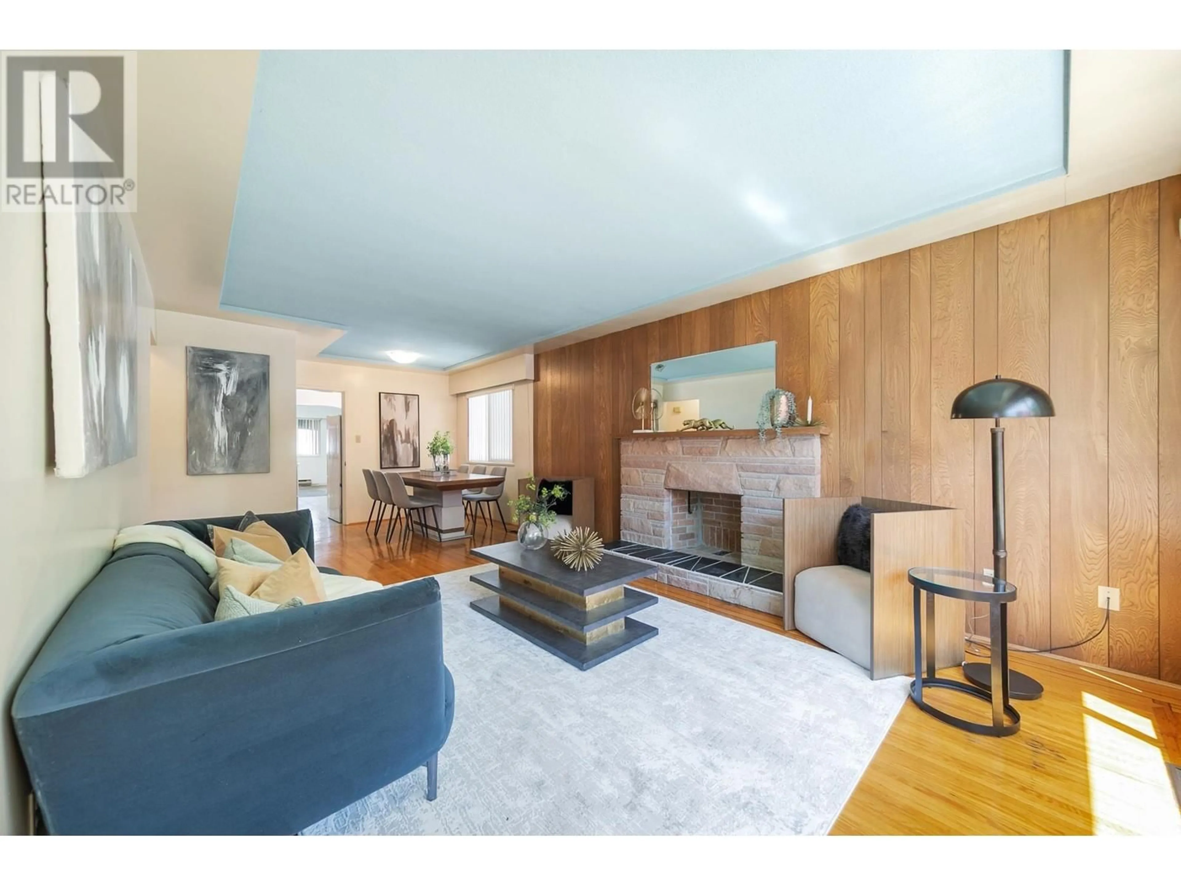 Living room with furniture, wood/laminate floor for 2331 46TH AVENUE, Vancouver British Columbia V5S1A1