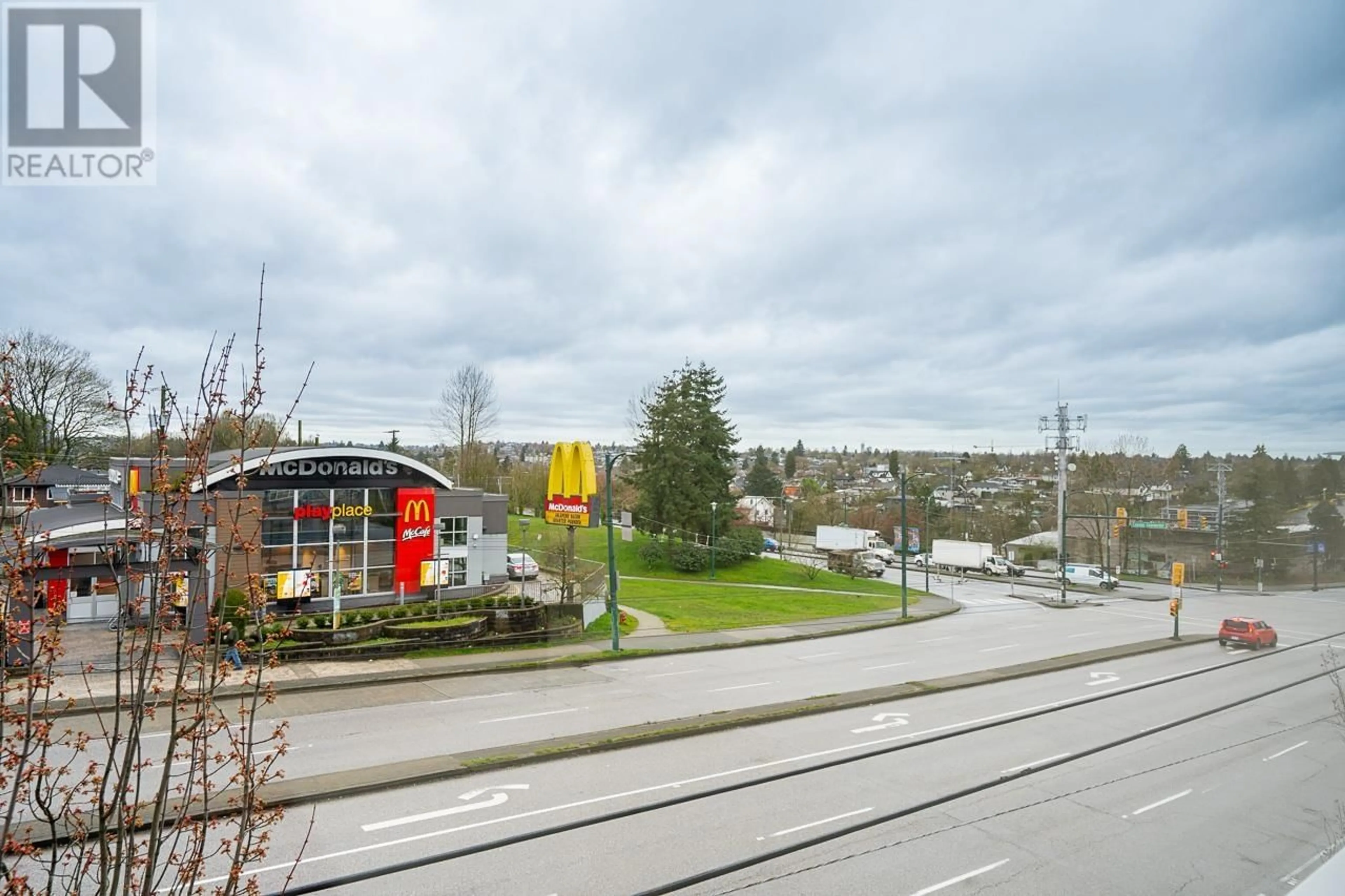 A pic from outside/outdoor area/front of a property/back of a property/a pic from drone, street for 303 - 3423 HASTINGS STREET, Vancouver British Columbia V5K2A5