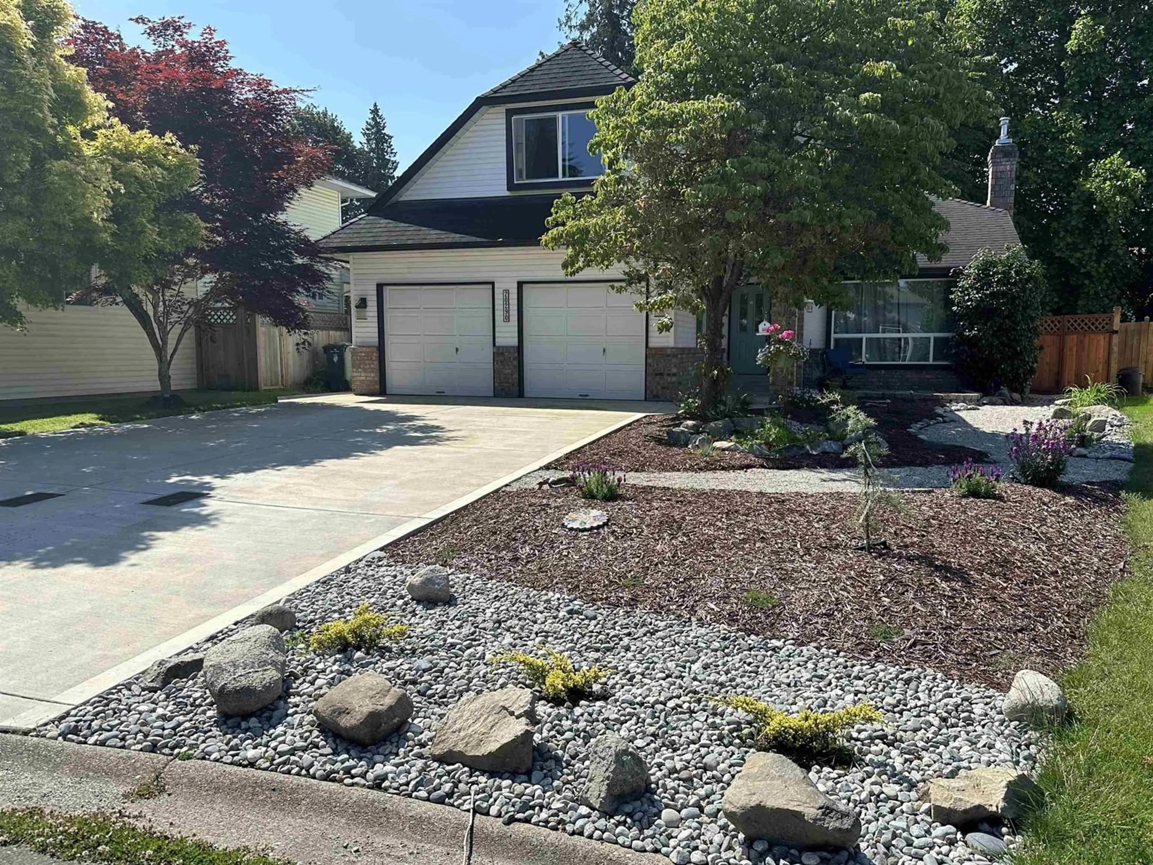 Home with vinyl exterior material, street for 20290 94A, Langley British Columbia V1M1G2