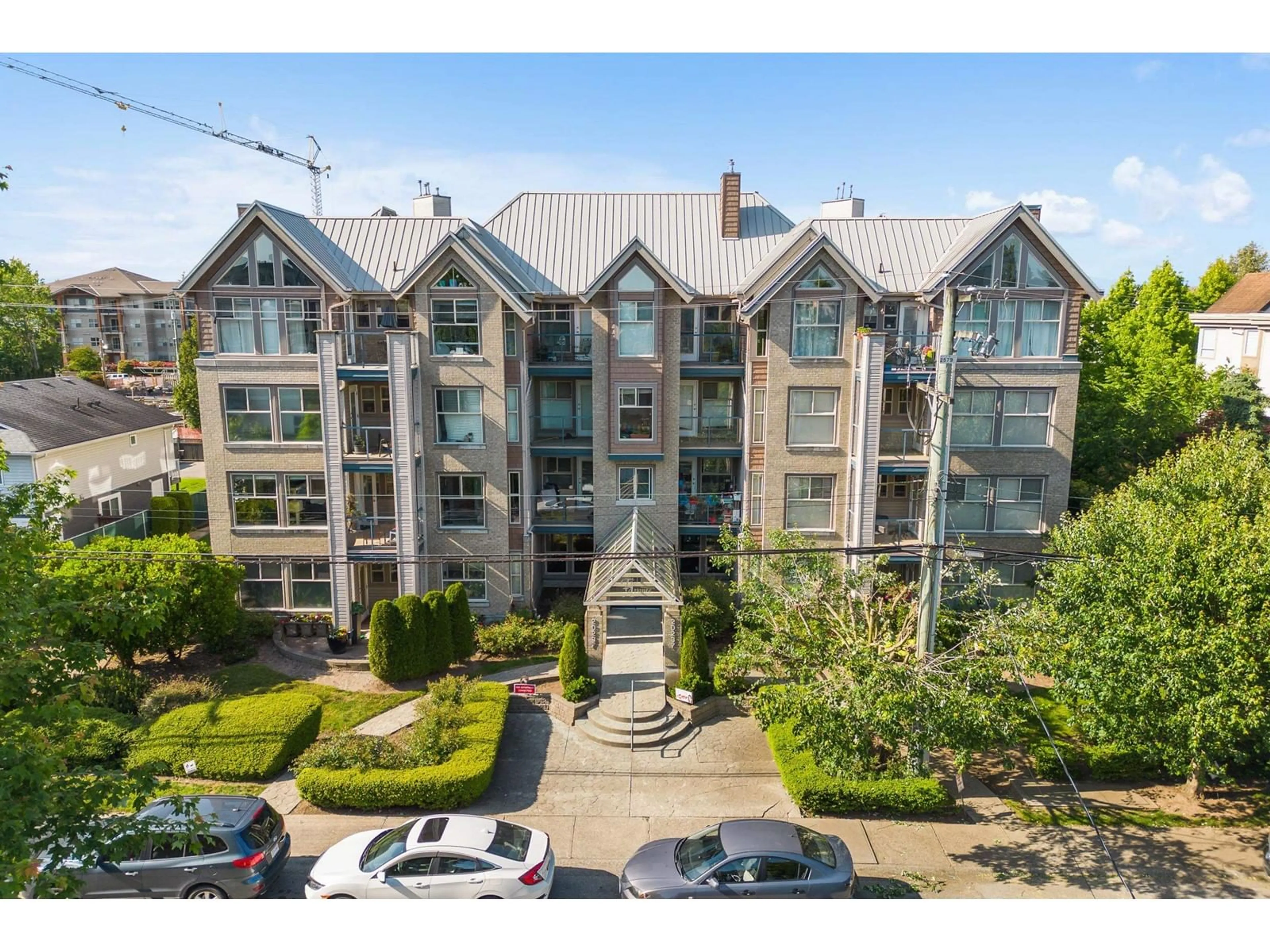 A pic from outside/outdoor area/front of a property/back of a property/a pic from drone, city buildings view from balcony for 202 - 20237 54, Langley British Columbia V3A3W2