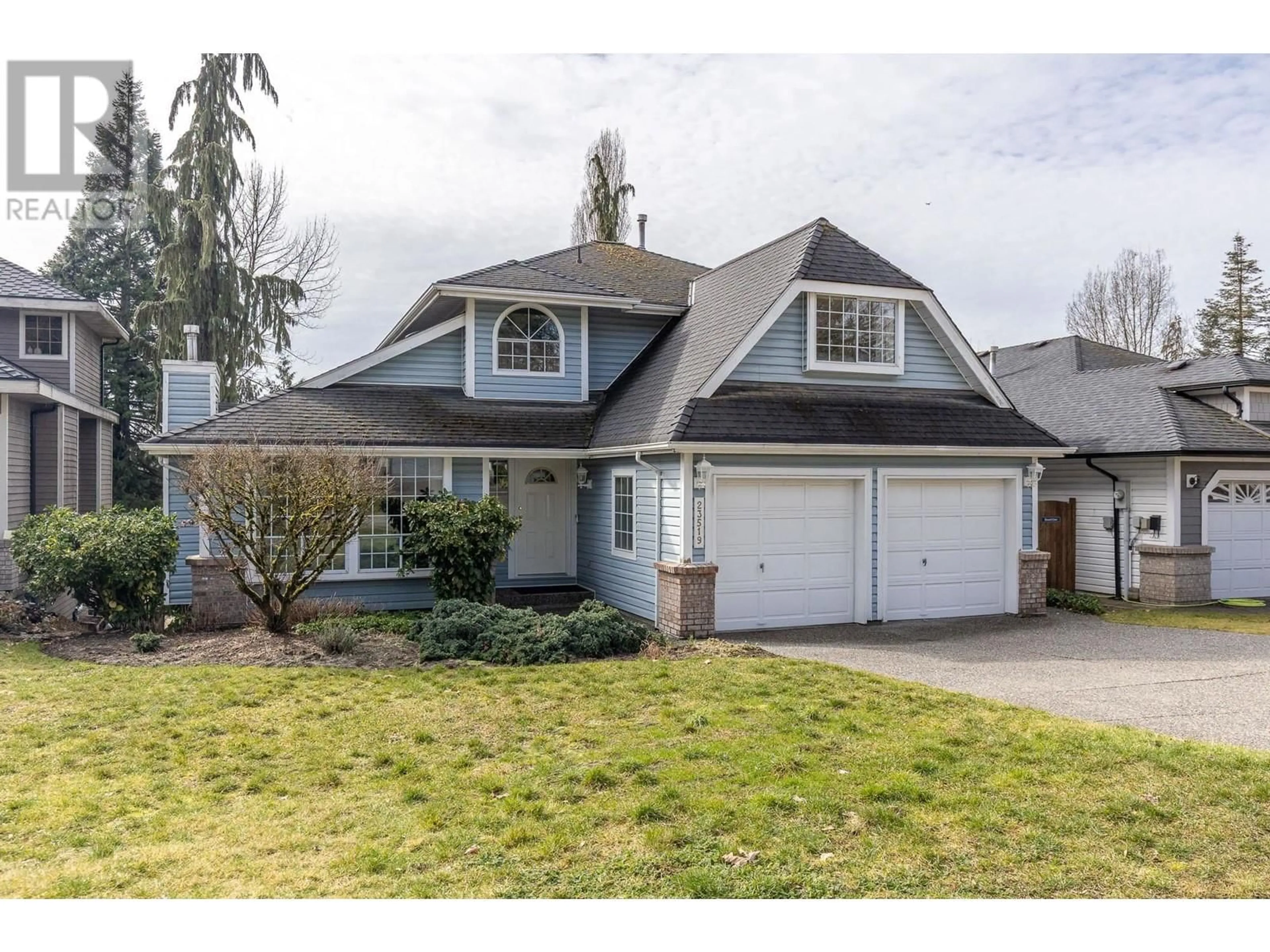 Home with vinyl exterior material, street for 23519 TAMARACK LANE, Maple Ridge British Columbia V2W1B1
