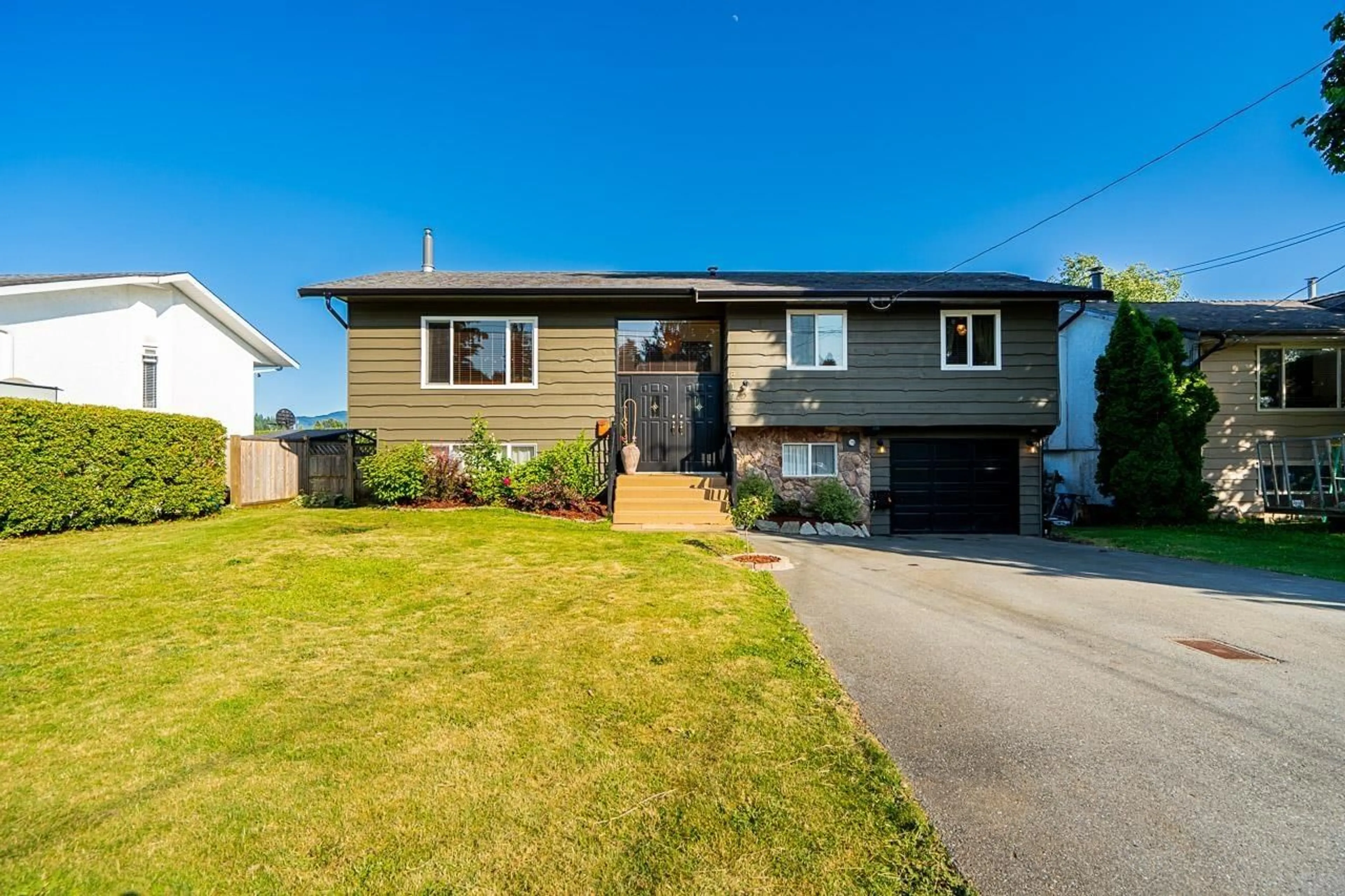 Home with vinyl exterior material, street for 8174 SUMAC, Mission British Columbia V2V5R6