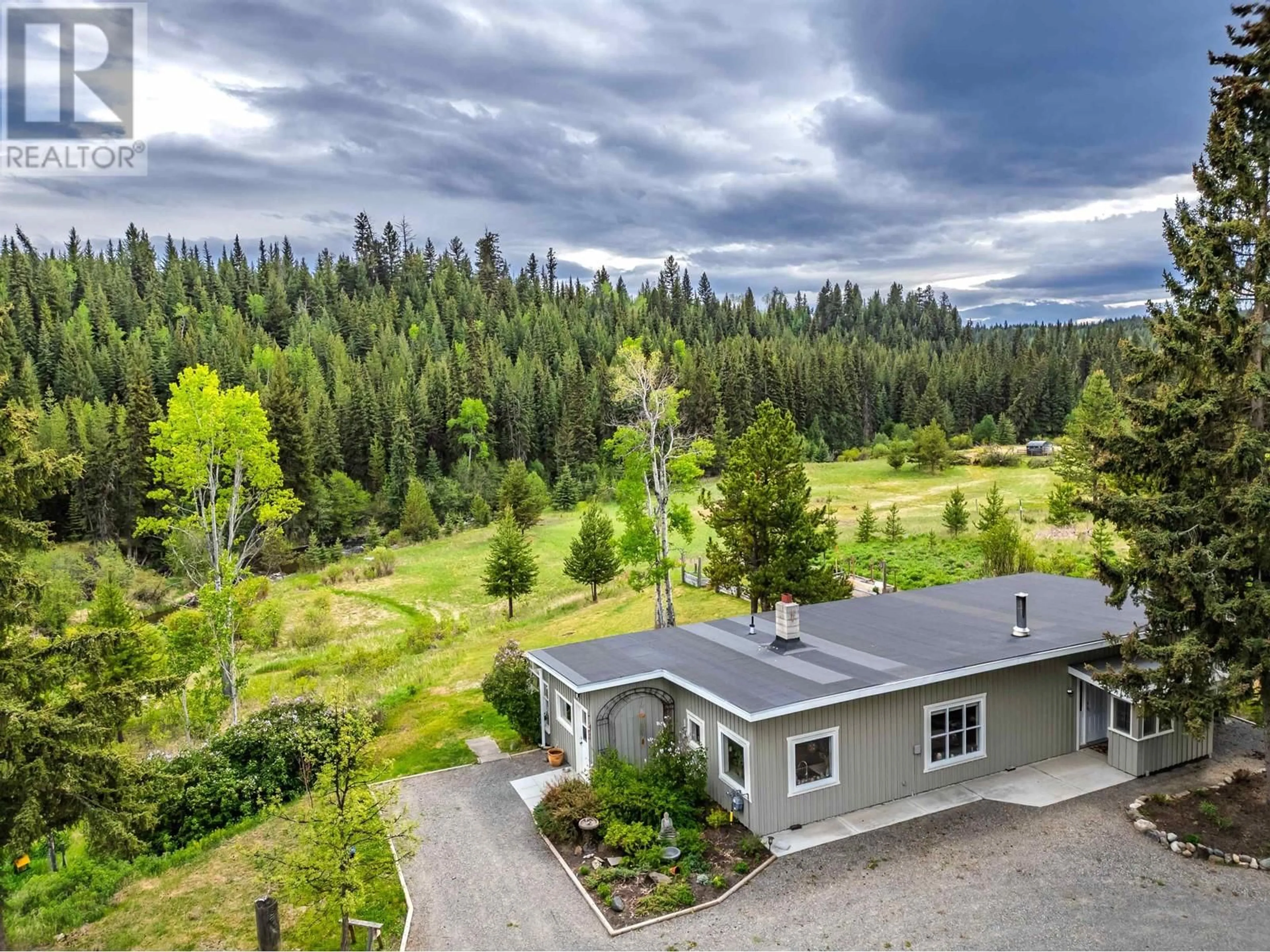A pic from outside/outdoor area/front of a property/back of a property/a pic from drone, forest/trees view for 5291 CANIM-HENDRIX LAKE ROAD, Forest Grove British Columbia V0K1M0