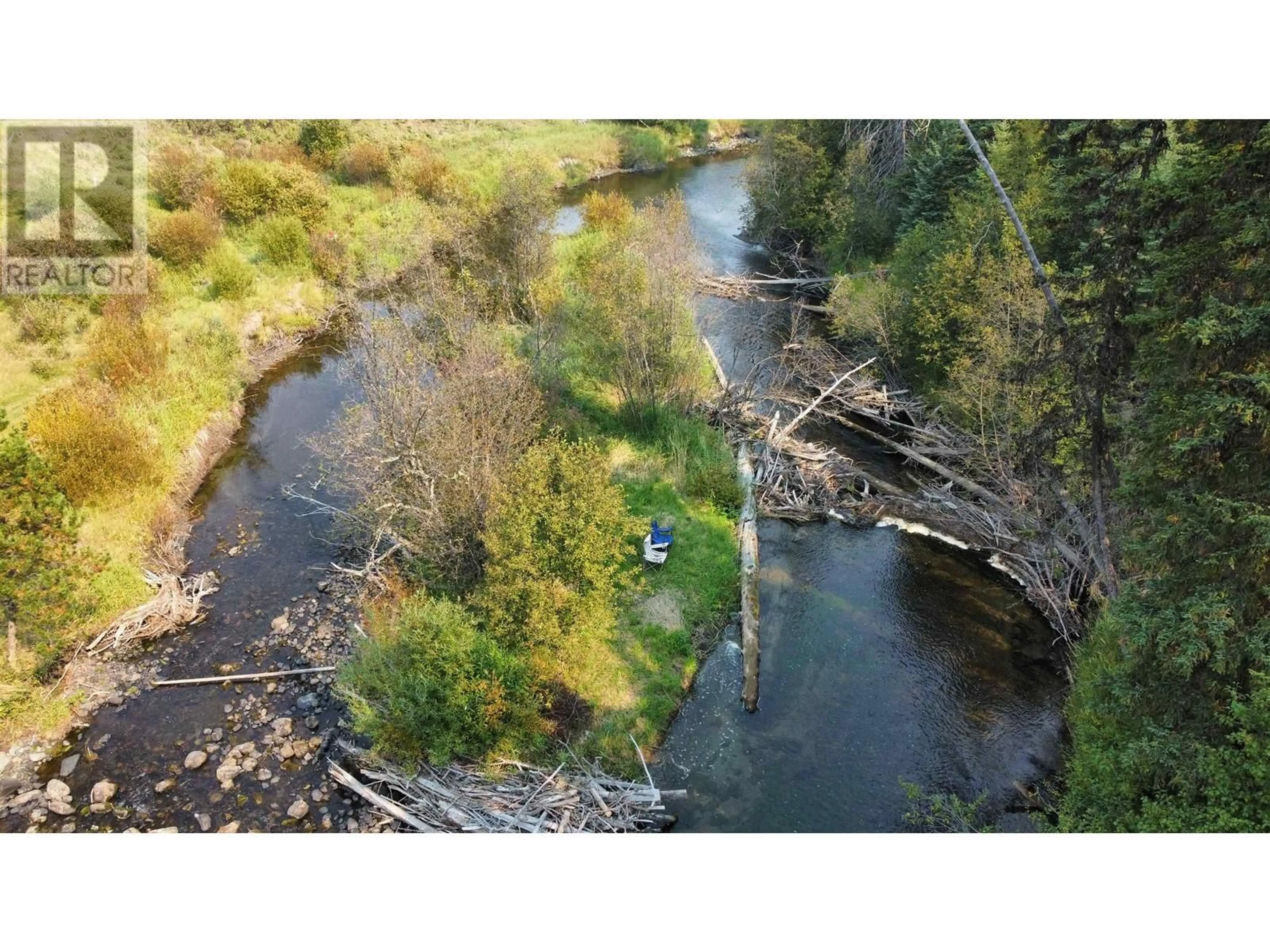 A pic from outside/outdoor area/front of a property/back of a property/a pic from drone, water/lake/river/ocean view for 5291 CANIM-HENDRIX LAKE ROAD, Forest Grove British Columbia V0K1M0