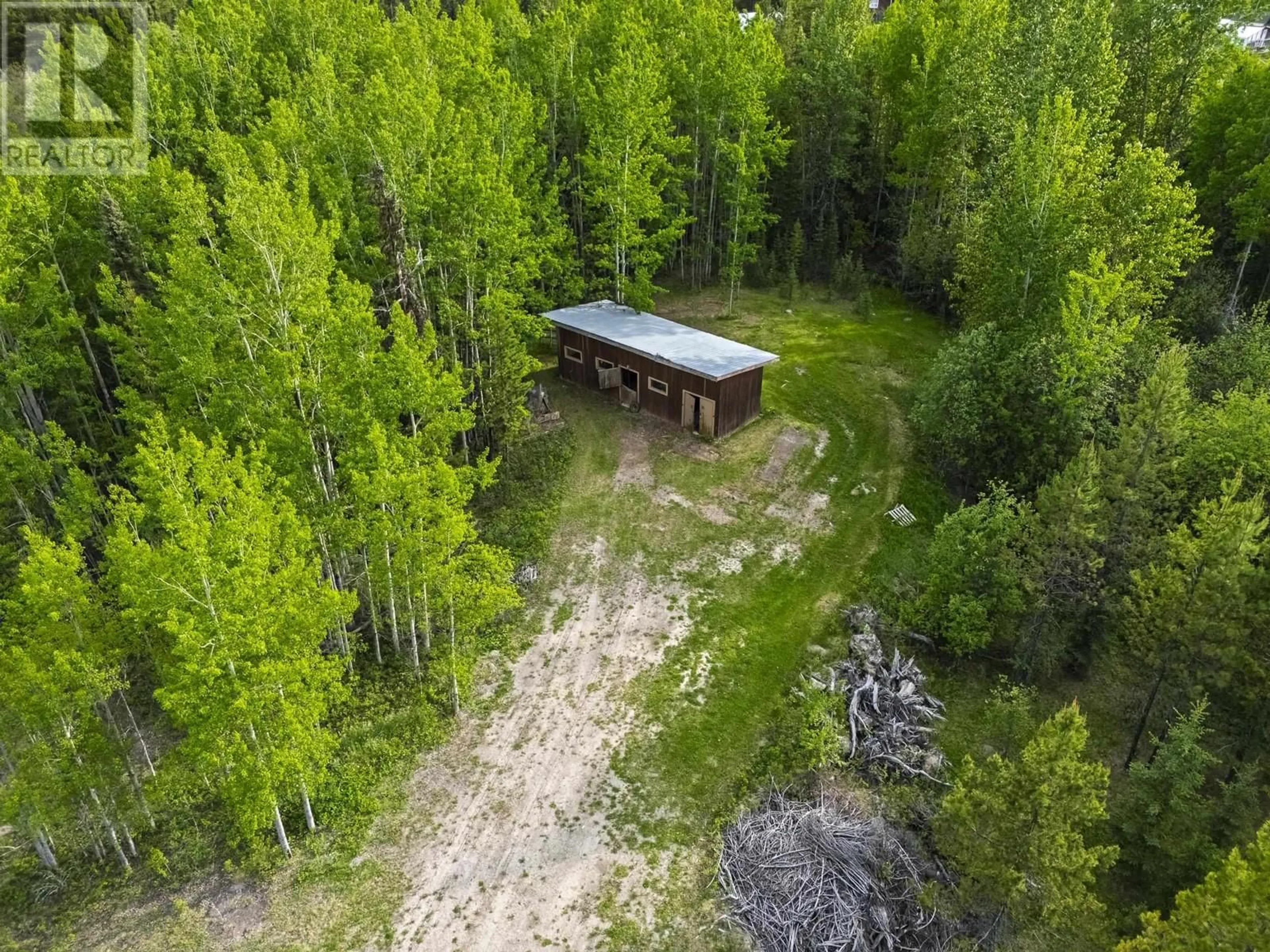A pic from outside/outdoor area/front of a property/back of a property/a pic from drone, forest/trees view for 11645 MAURAEN DRIVE, Prince George British Columbia V2N5B7