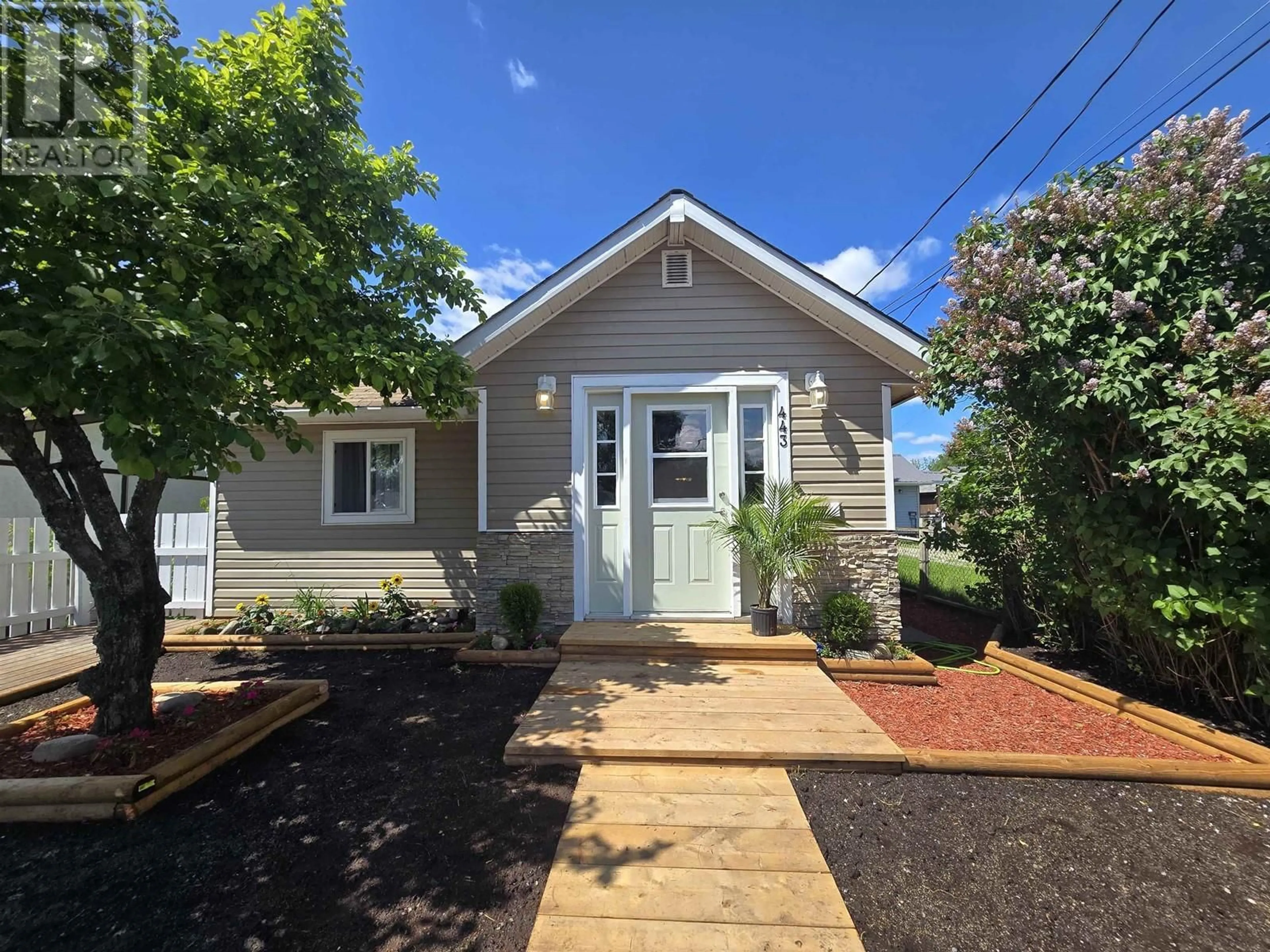 Home with vinyl exterior material, street for 443 HARTLEY STREET, Quesnel British Columbia V2J1W7