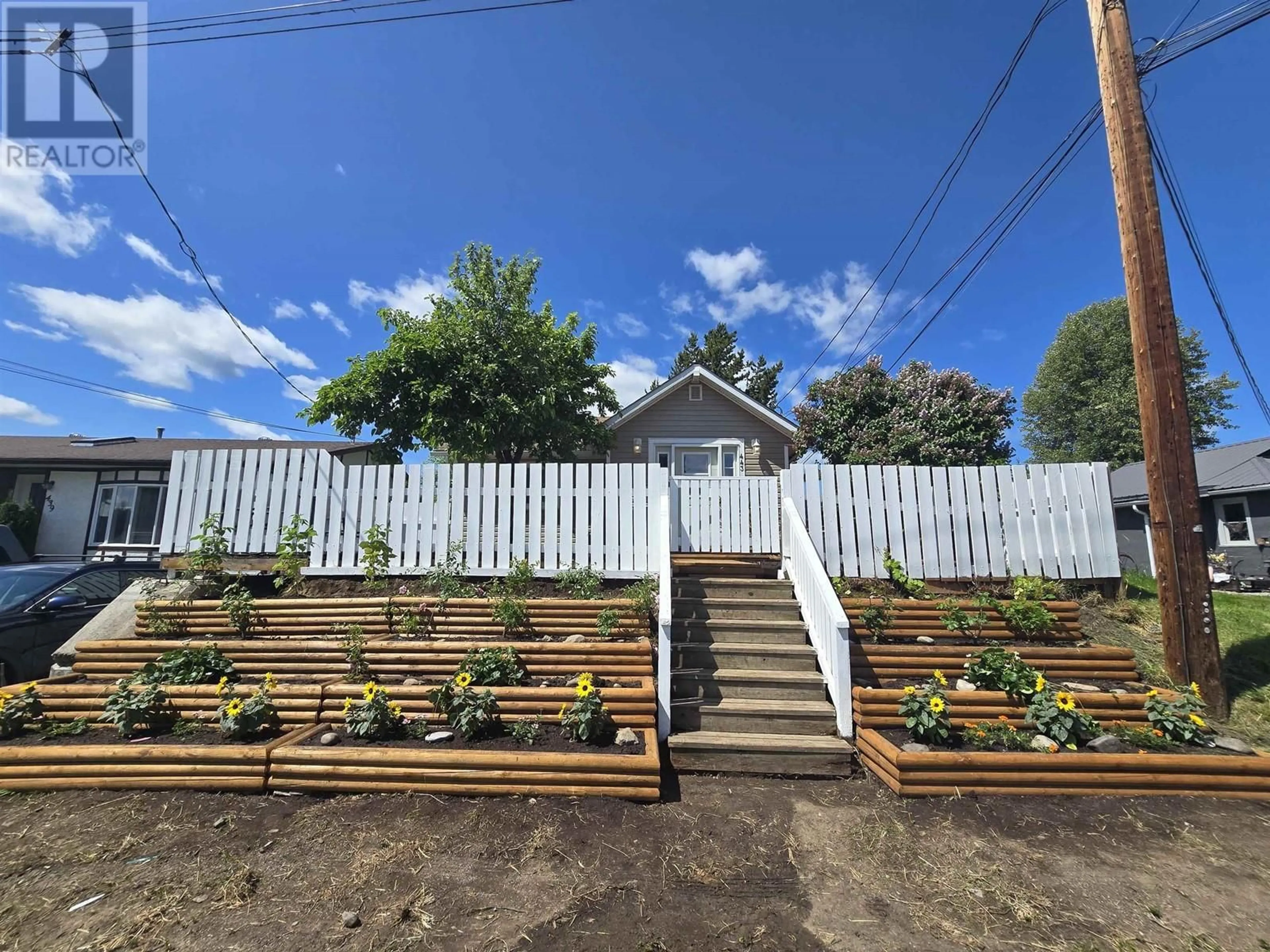 A pic from outside/outdoor area/front of a property/back of a property/a pic from drone, street for 443 HARTLEY STREET, Quesnel British Columbia V2J1W7