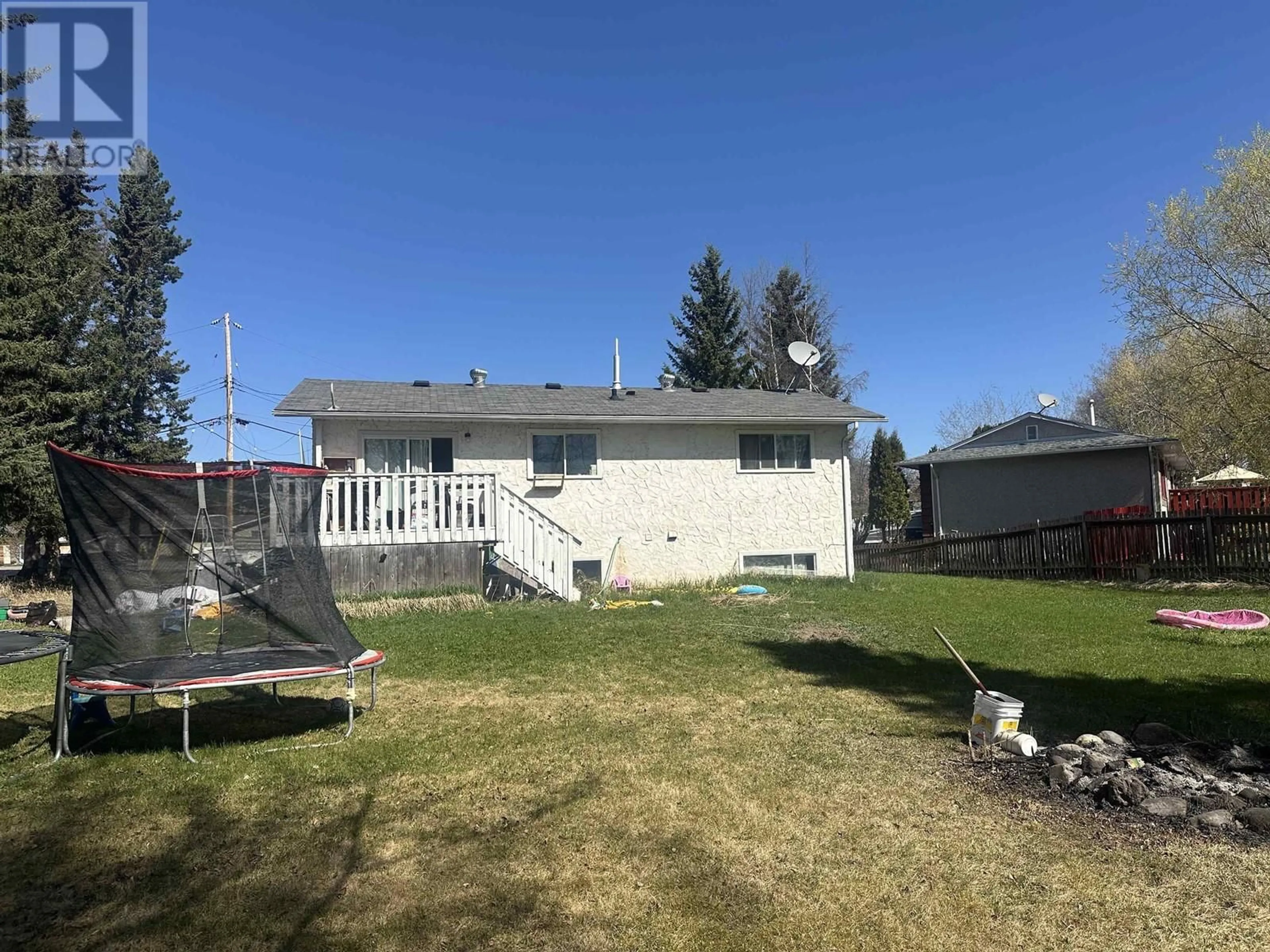 A pic from outside/outdoor area/front of a property/back of a property/a pic from drone, unknown for 404 VANDERVIEW DRIVE, Vanderhoof British Columbia V0J3A2