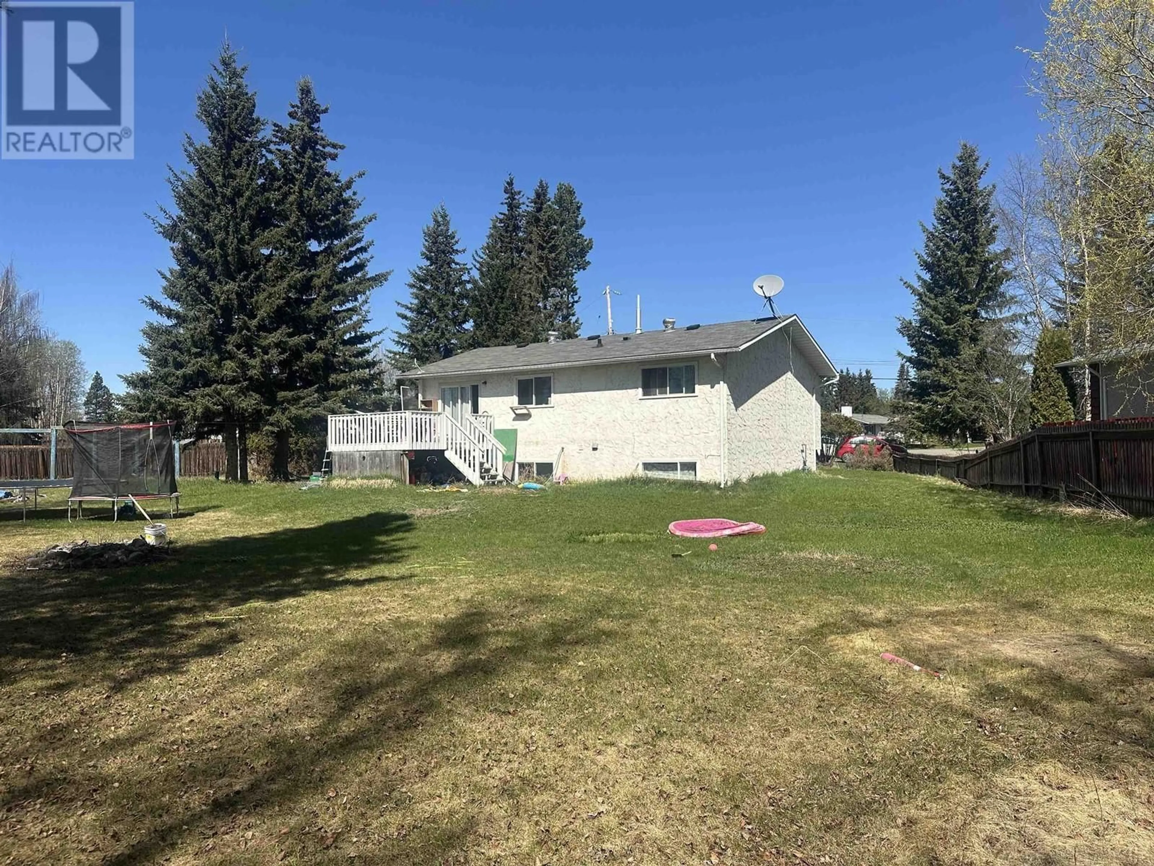 A pic from outside/outdoor area/front of a property/back of a property/a pic from drone, mountain view for 404 VANDERVIEW DRIVE, Vanderhoof British Columbia V0J3A2