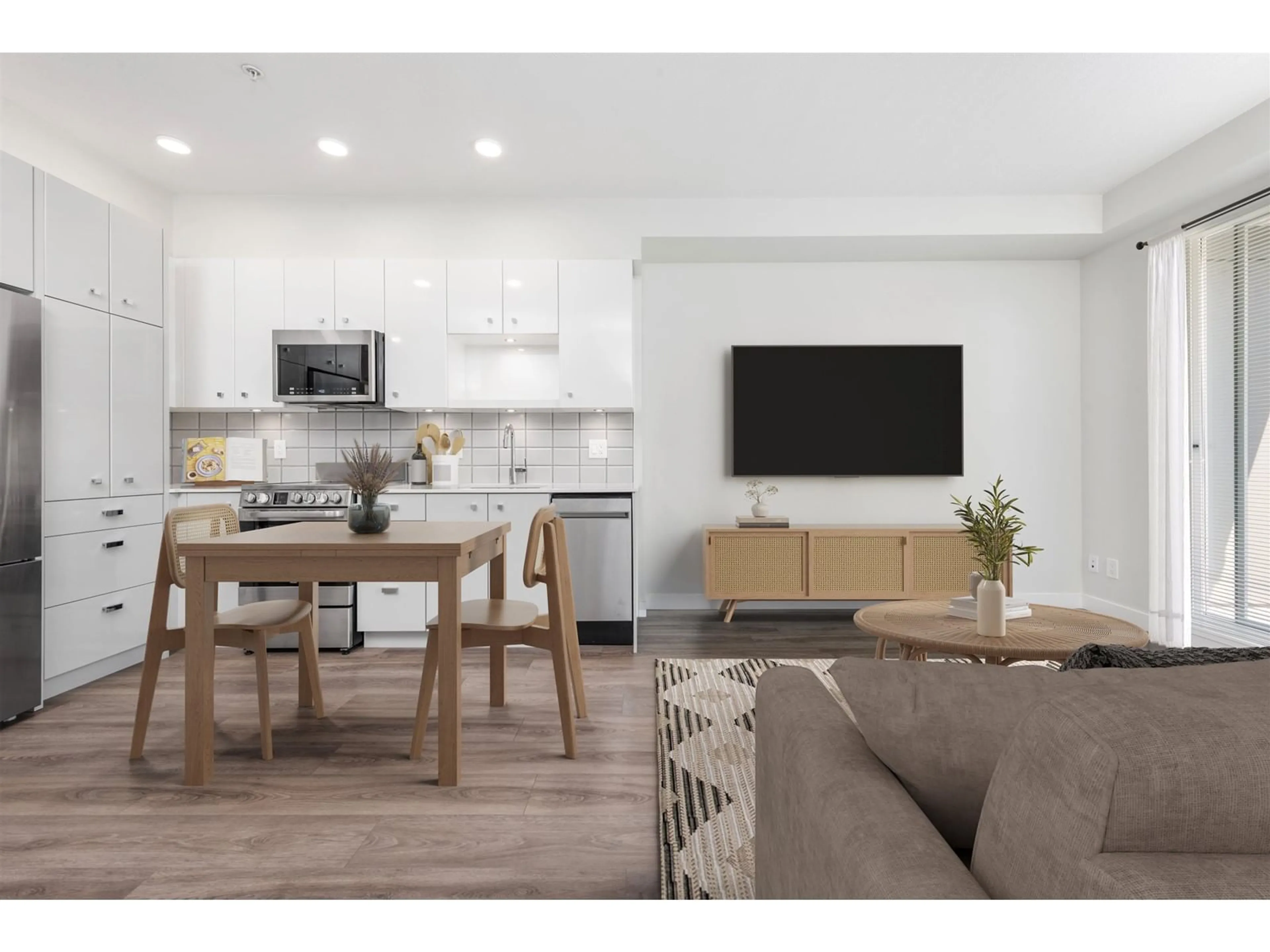 Open concept kitchen, wood/laminate floor for 322 - 10838 WHALLEY, Surrey British Columbia V3R0G8