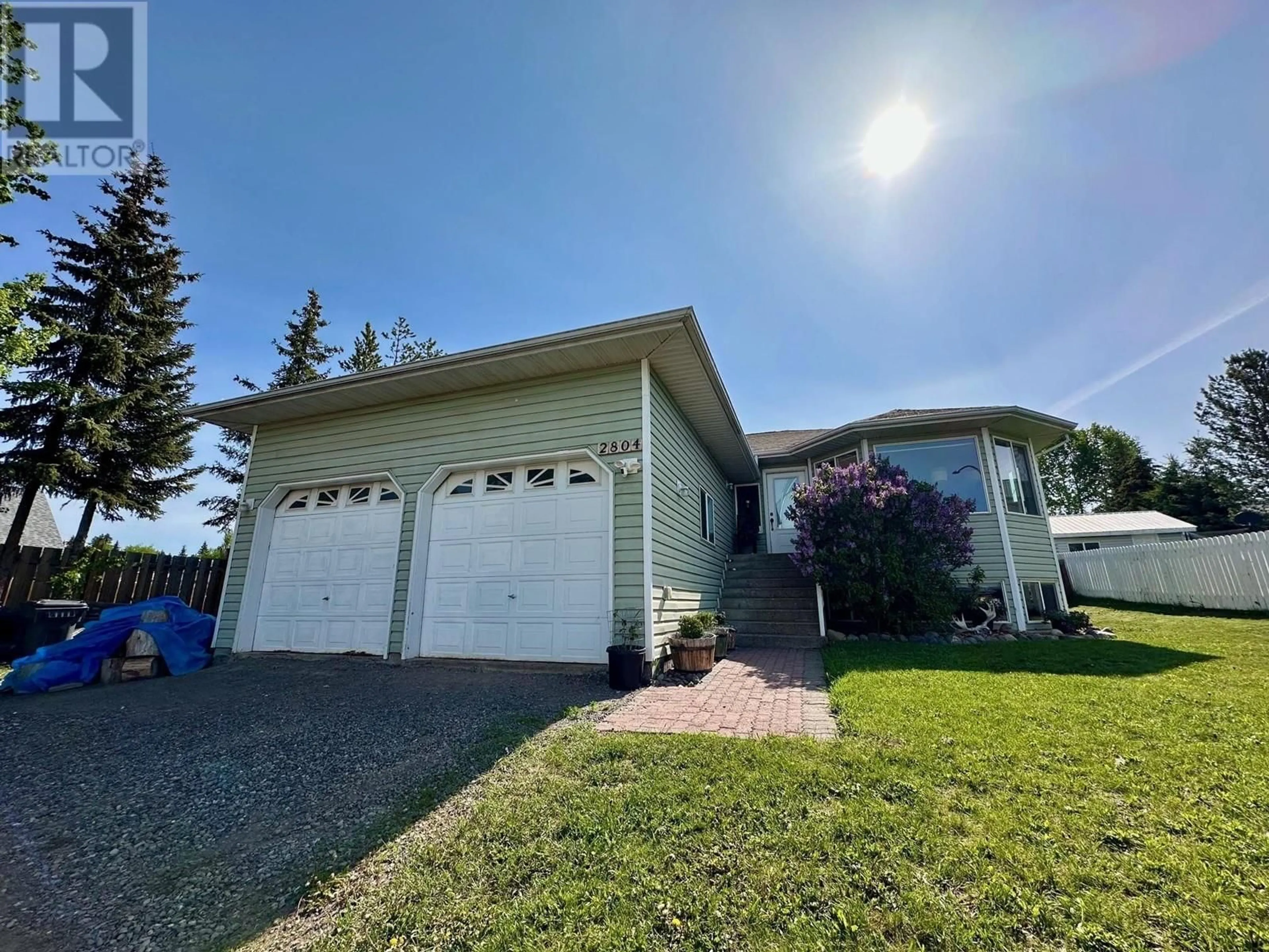 Home with vinyl exterior material, street for 2804 OLSSON ROAD, Houston British Columbia V0J1Z0
