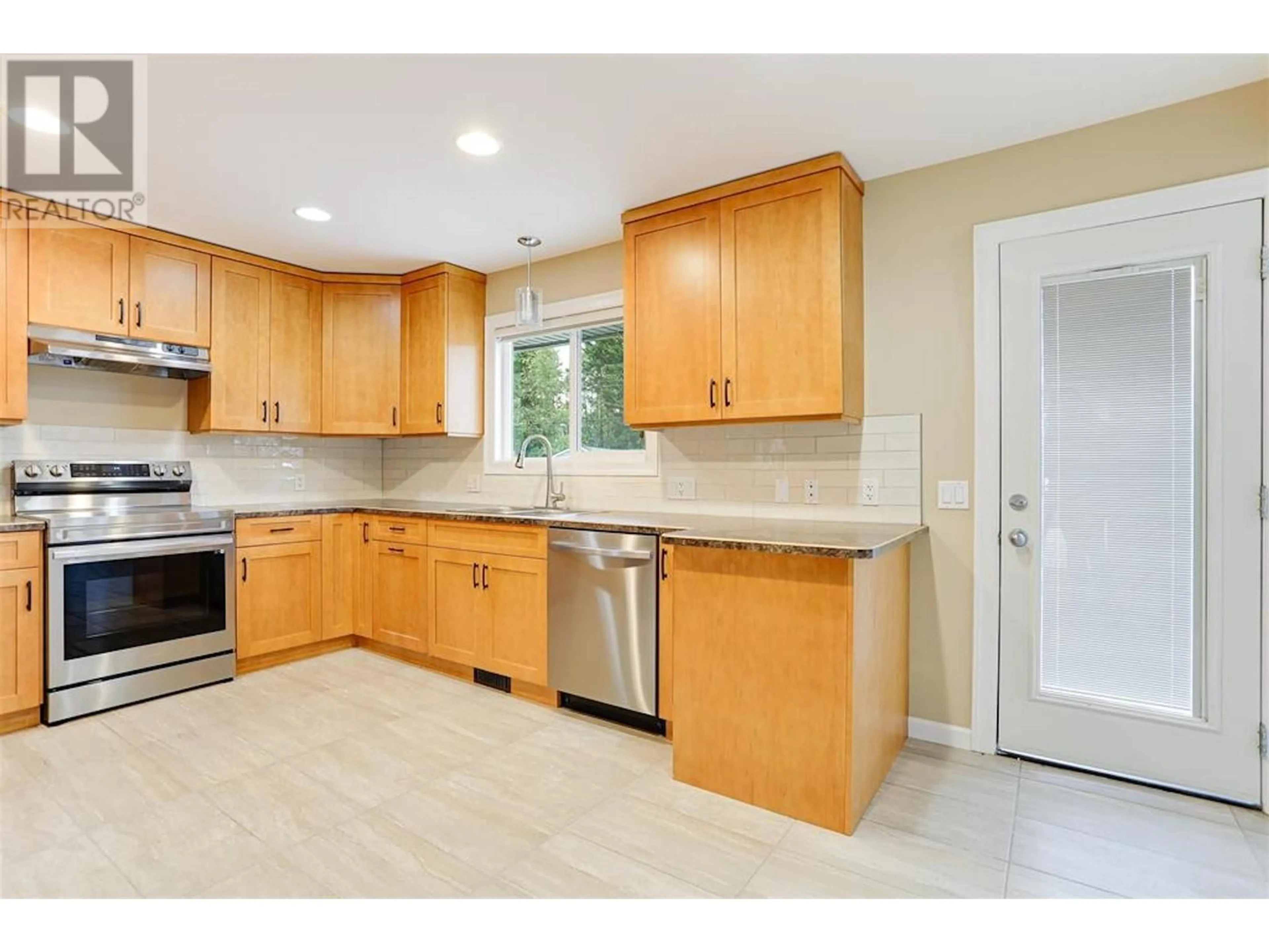 Standard kitchen, ceramic/tile floor for 1461 CORMORANT AVENUE, Kitimat British Columbia V8C1R9