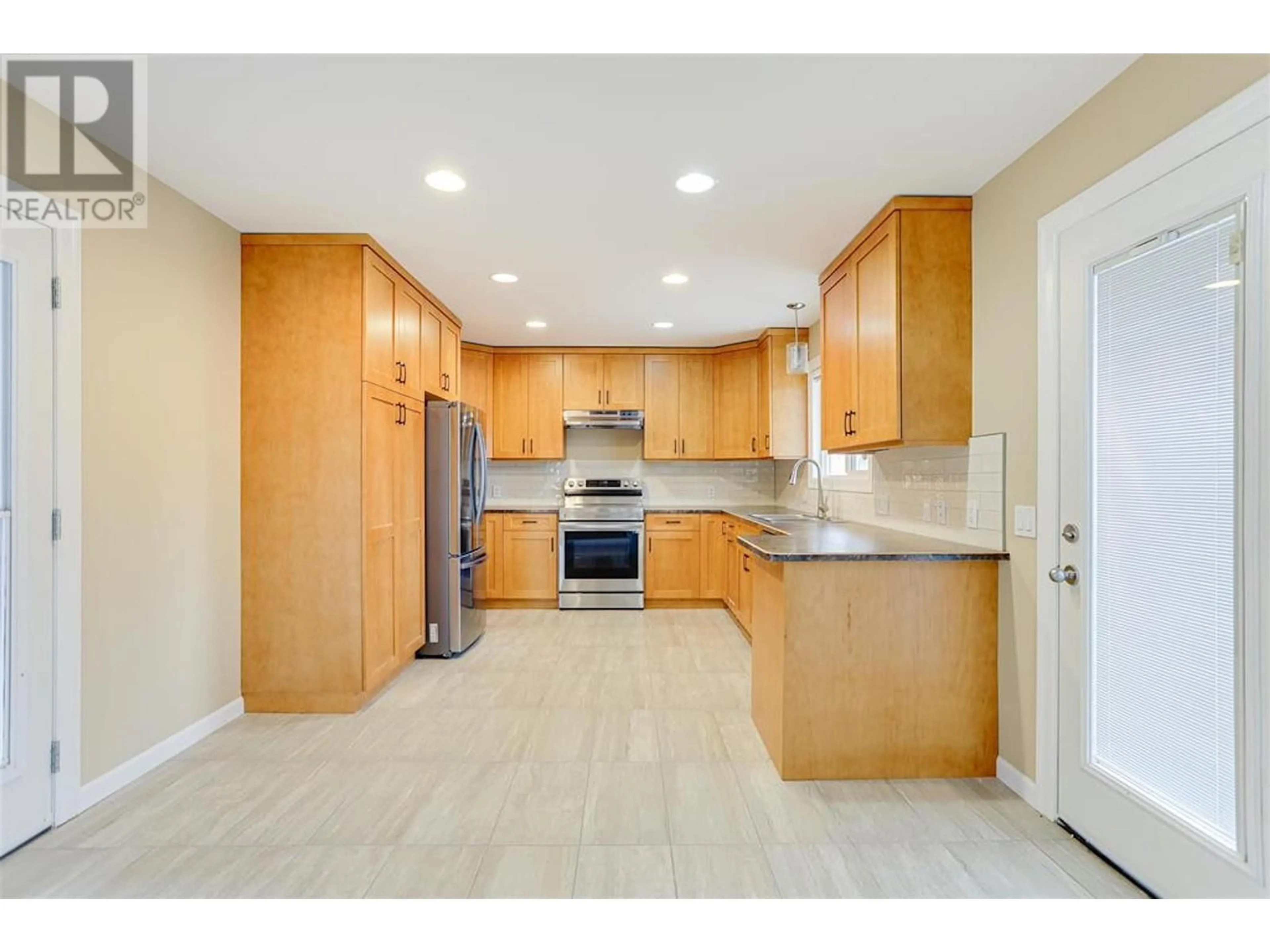Open concept kitchen, ceramic/tile floor for 1461 CORMORANT AVENUE, Kitimat British Columbia V8C1R9