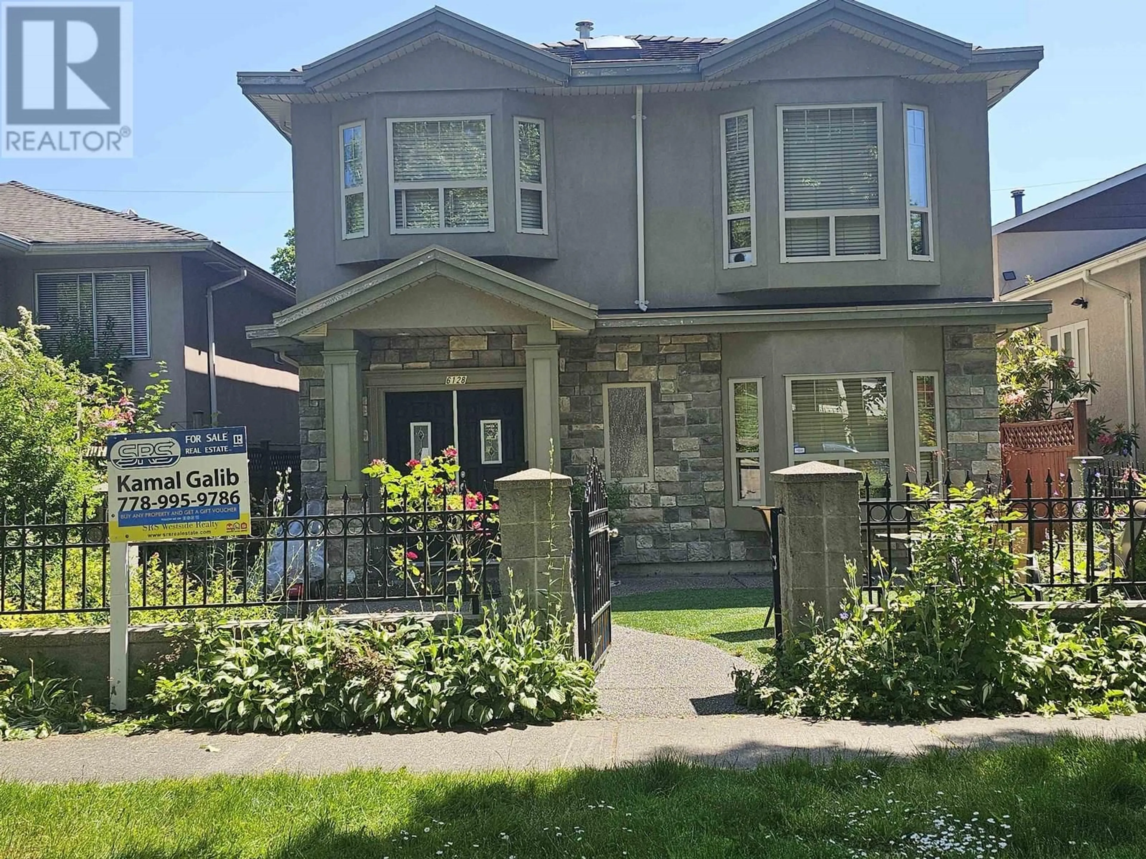 Home with brick exterior material, street for 6128 ST. CATHERINES STREET, Vancouver British Columbia V5W3G6