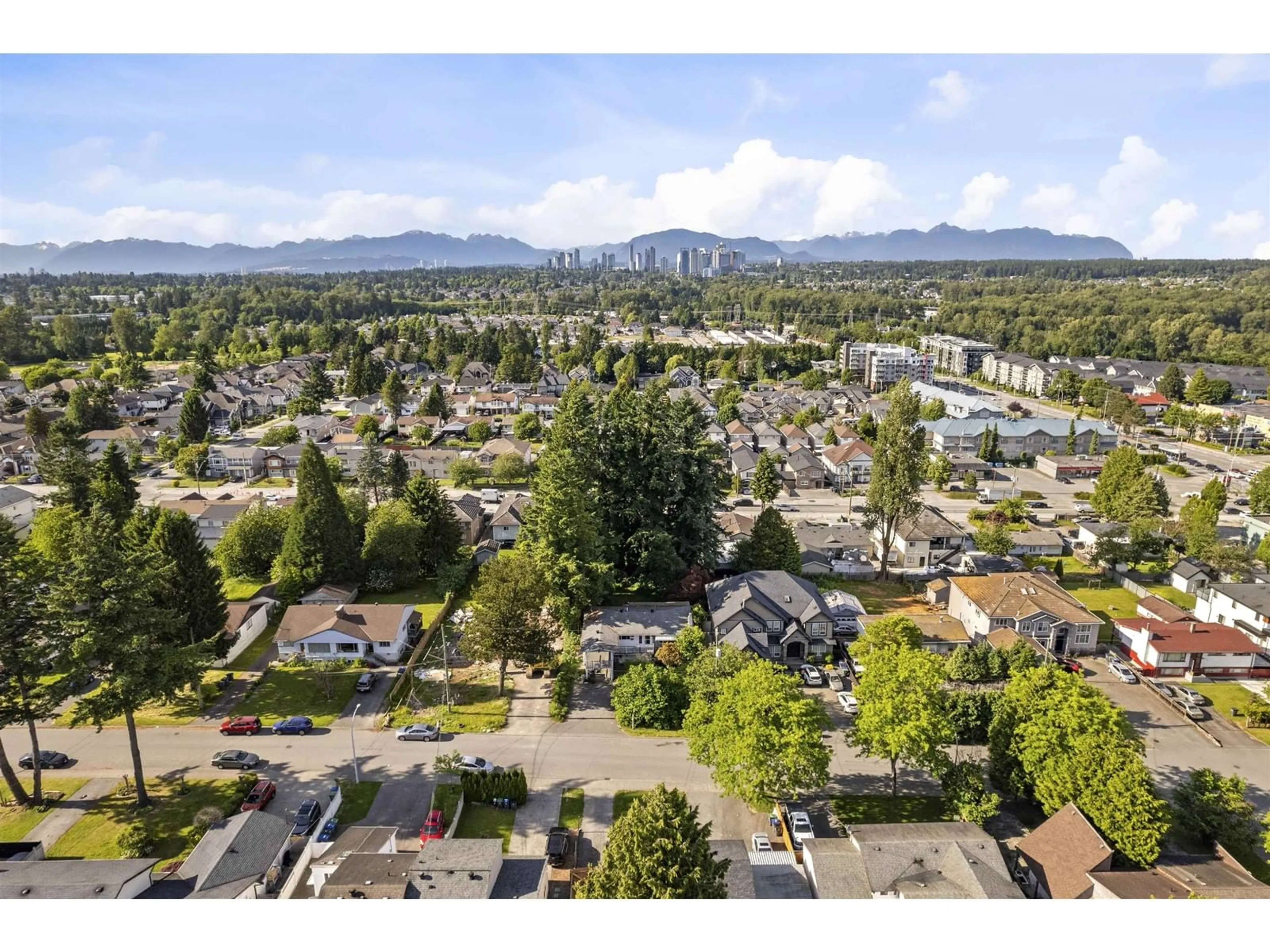 A pic from outside/outdoor area/front of a property/back of a property/a pic from drone, mountain view for 13517 79A, Surrey British Columbia V3W2Z3