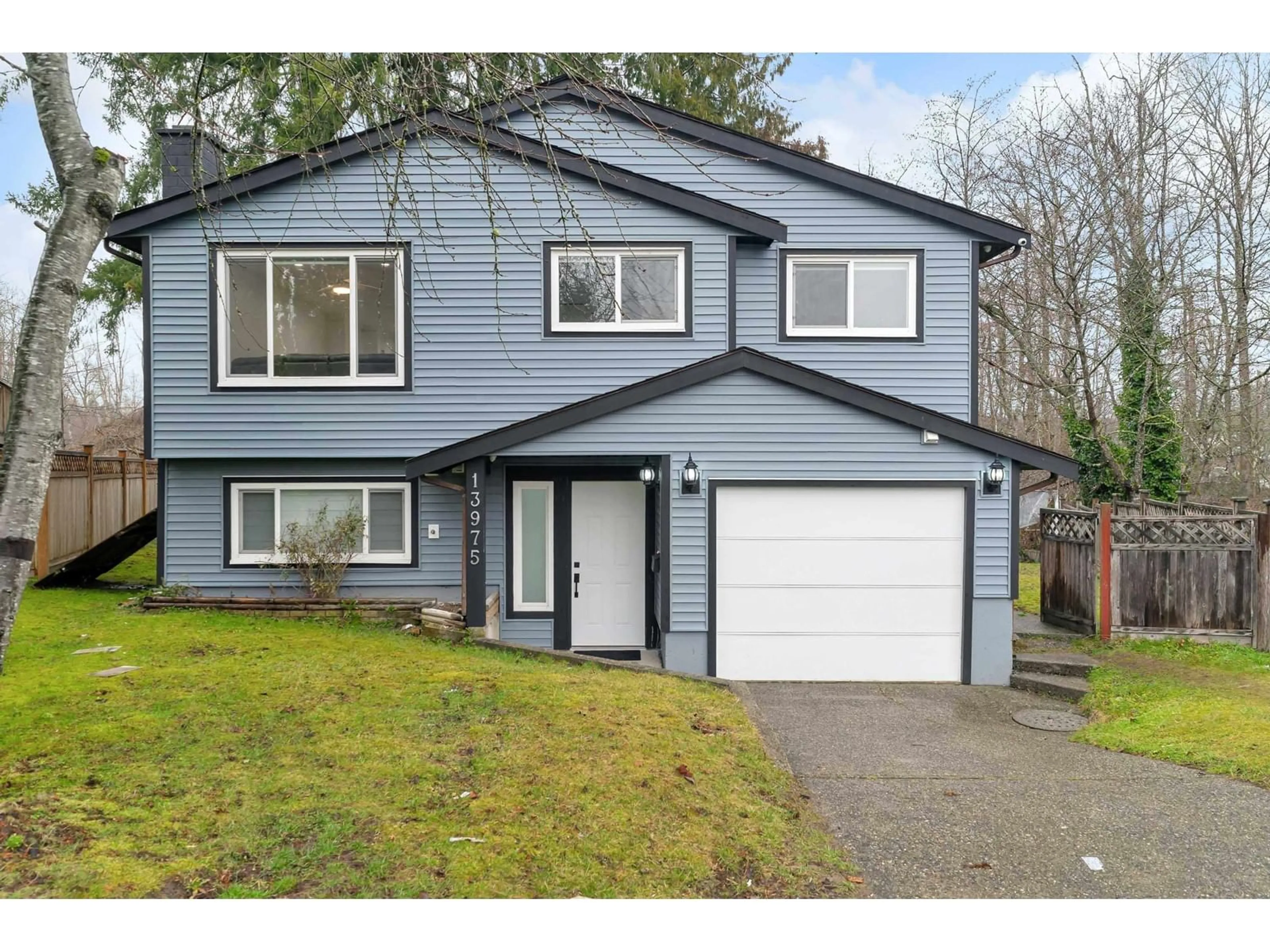 Home with vinyl exterior material, street for 13975 80B, Surrey British Columbia V3W6P7