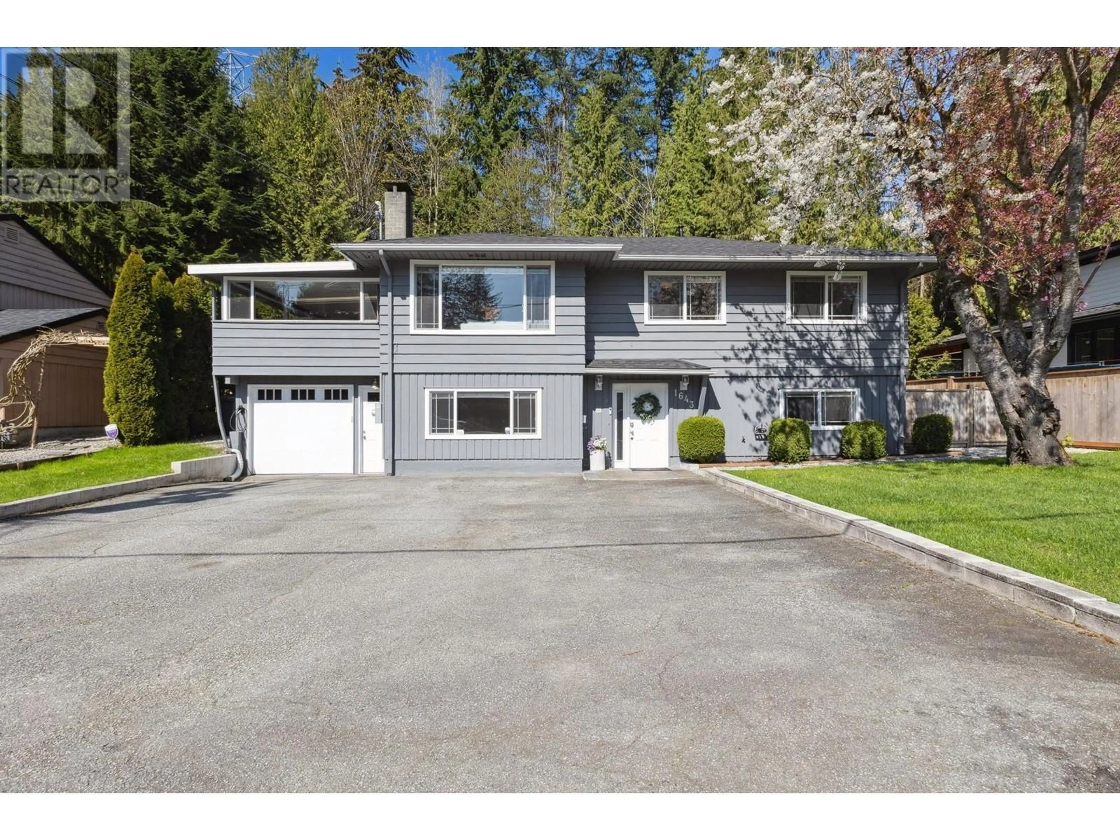 Home with vinyl exterior material, street for 1643 ARBORLYNN DRIVE, North Vancouver British Columbia V7J2V7