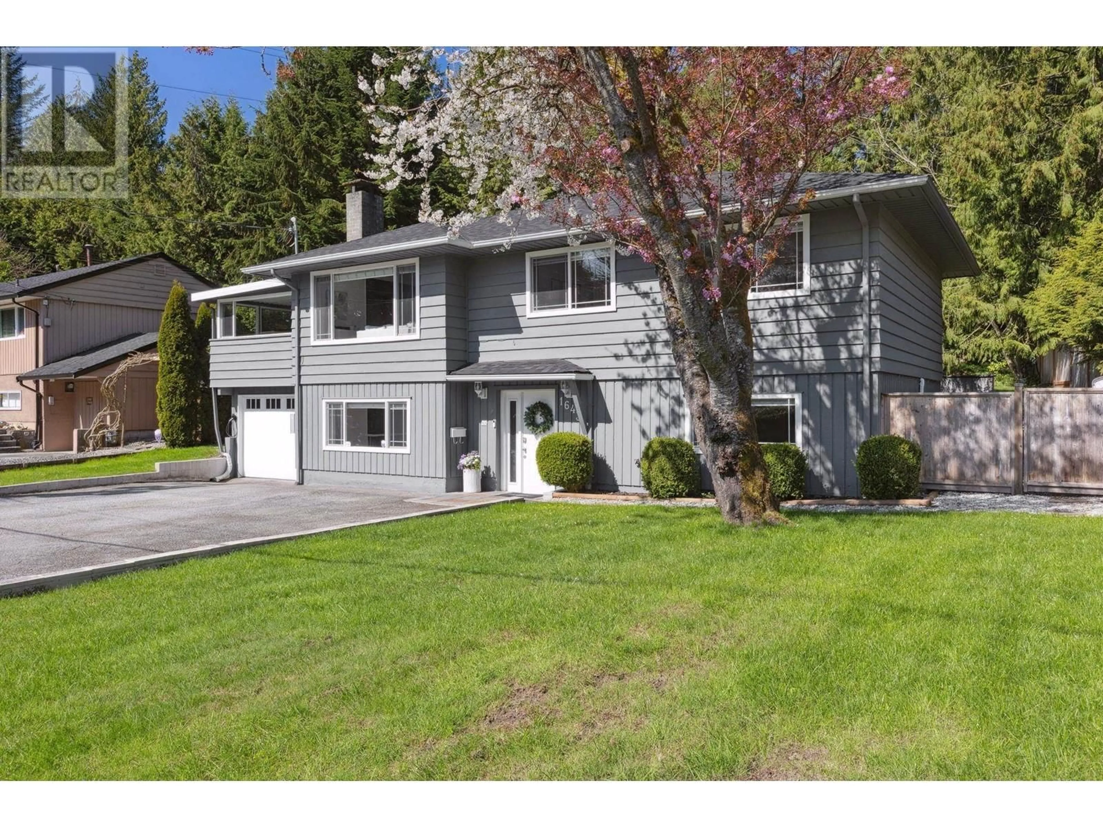 Home with vinyl exterior material, street for 1643 ARBORLYNN DRIVE, North Vancouver British Columbia V7J2V7