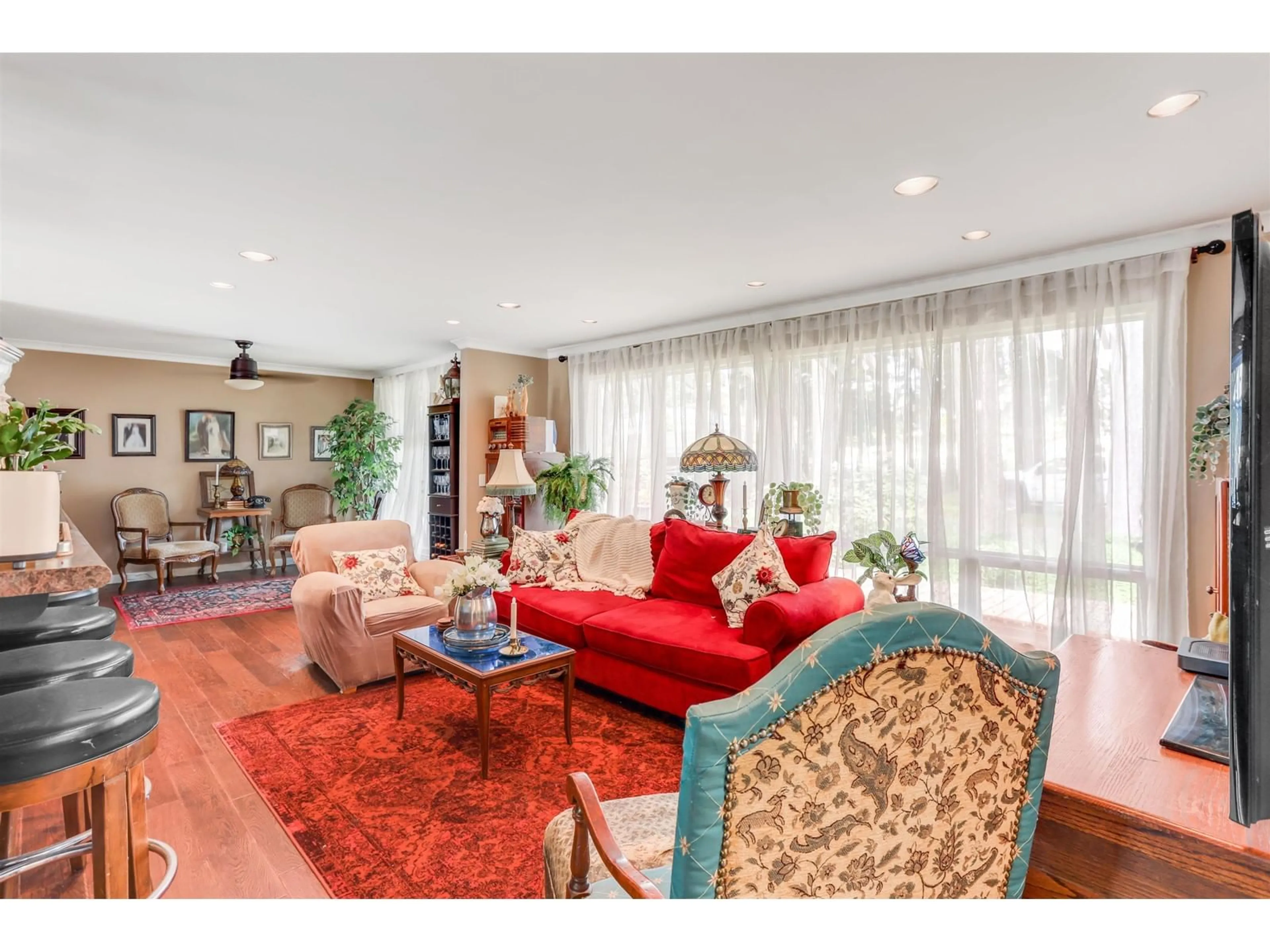 Living room with furniture, wood/laminate floor for 12248 NEW MCLELLAN, Surrey British Columbia V3X2Y1