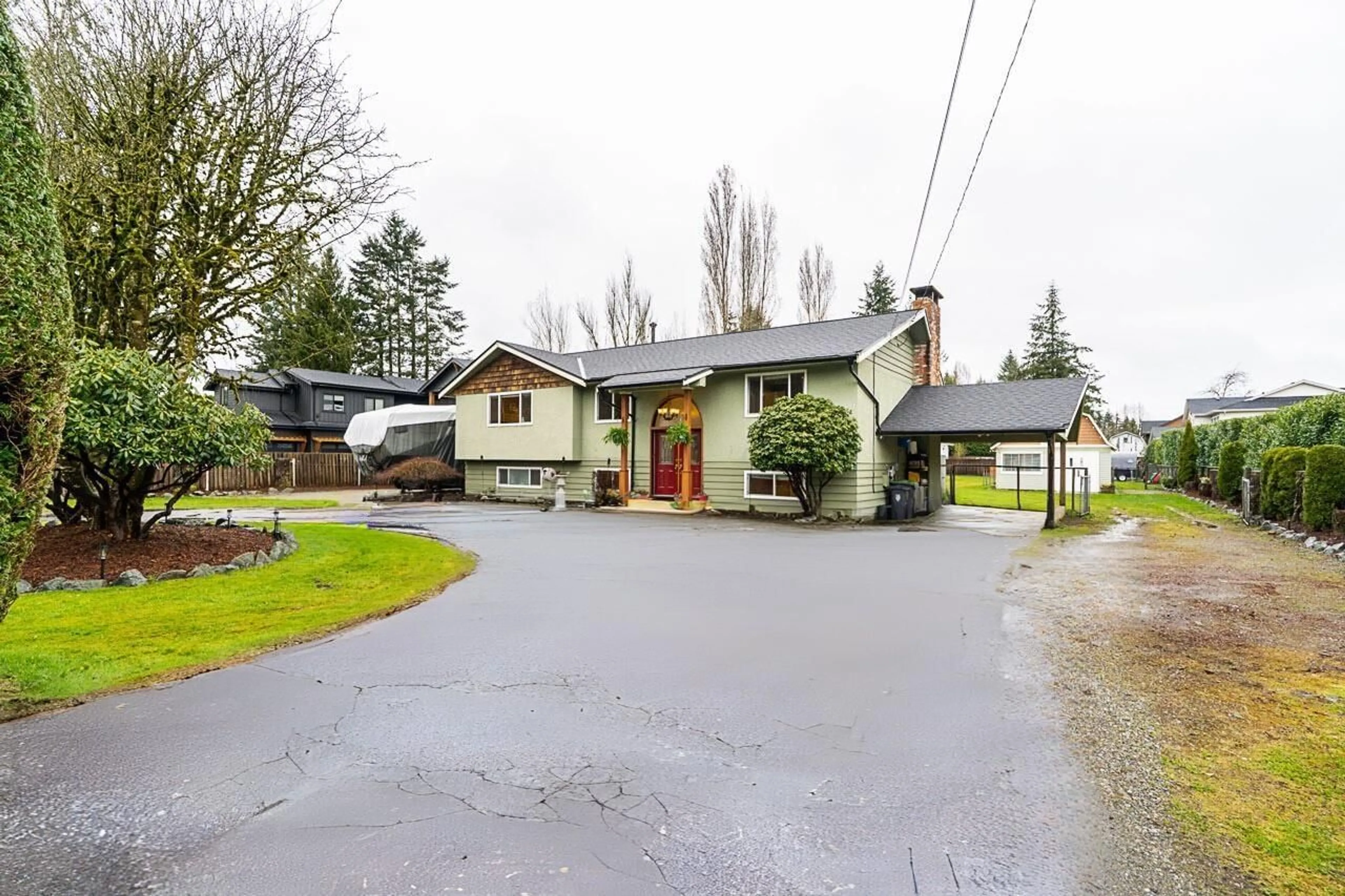 A pic from outside/outdoor area/front of a property/back of a property/a pic from drone, street for 24457 56, Langley British Columbia V2Z1B8