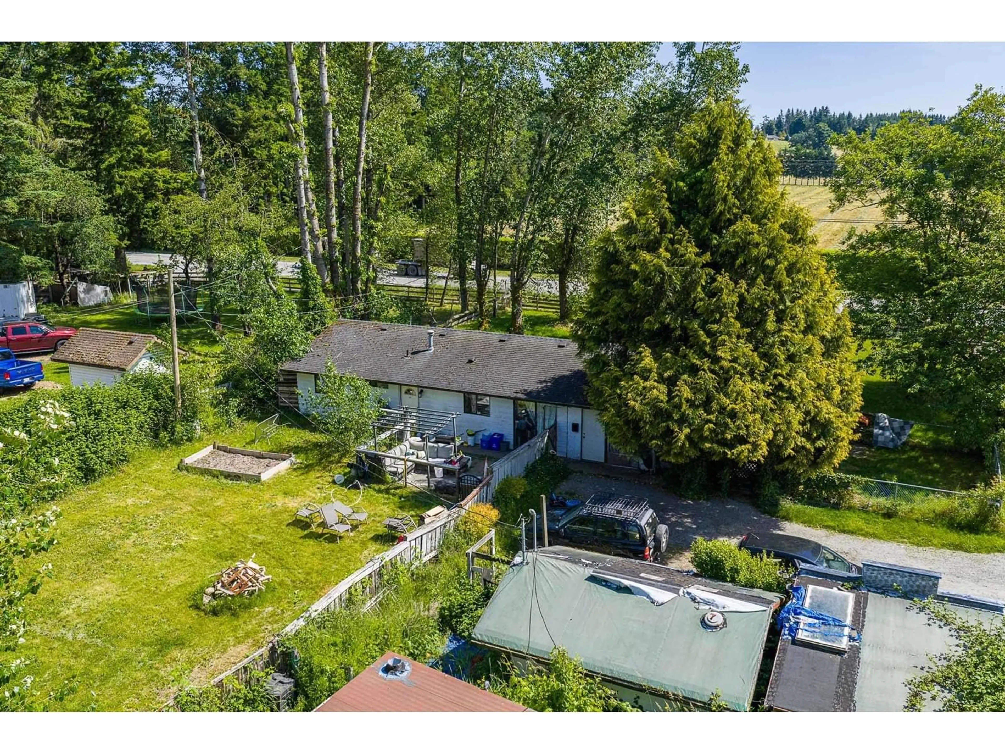 A pic from outside/outdoor area/front of a property/back of a property/a pic from drone, water/lake/river/ocean view for 19675 16, Langley British Columbia V2Z1K2
