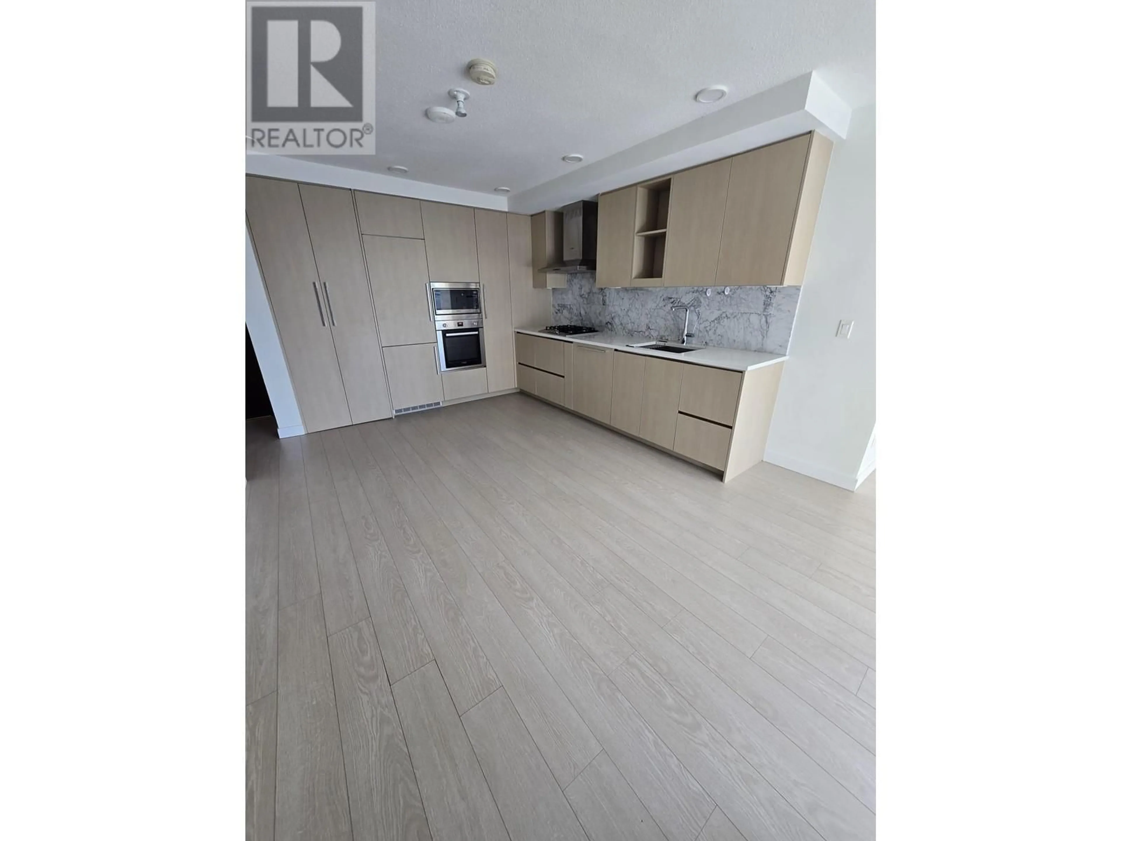 Open concept kitchen, wood/laminate floor for 883 - 3311 KETCHESON ROAD, Richmond British Columbia V6X0S4