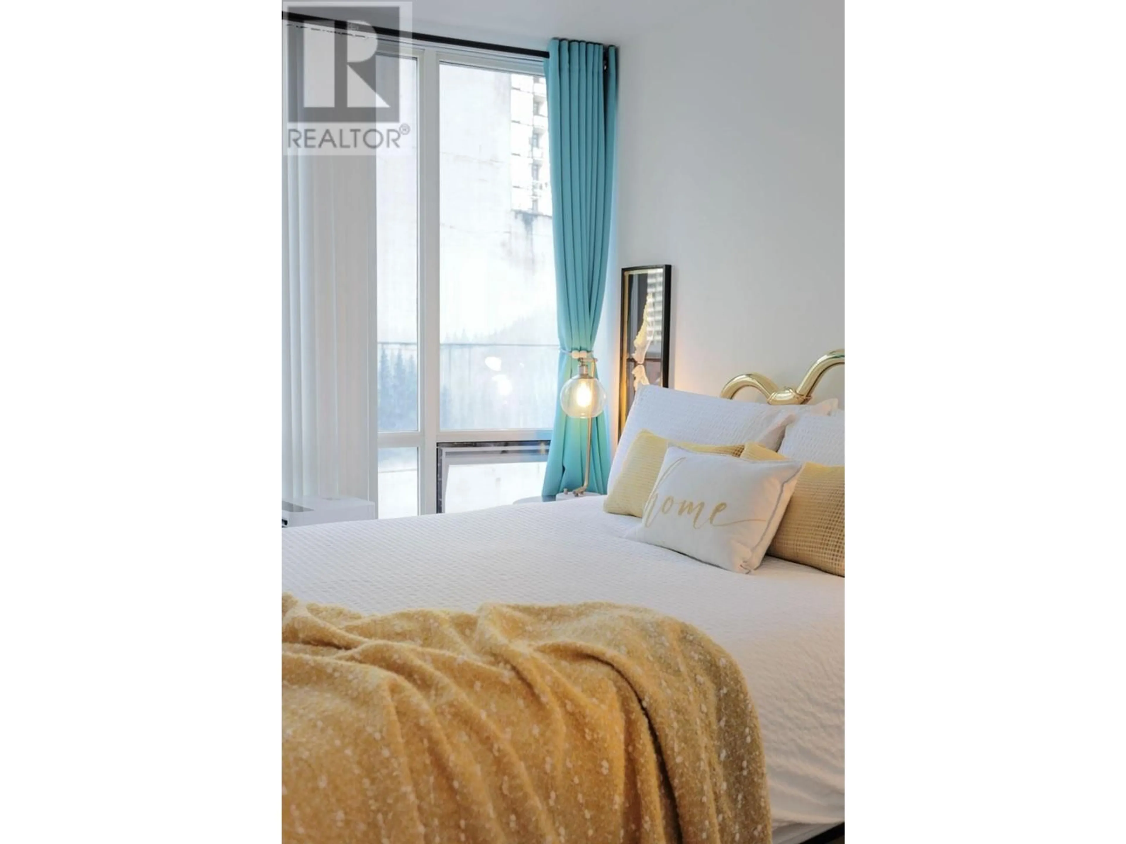 Bedroom with bed, wood/laminate floor for 805 - 1166 MELVILLE STREET, Vancouver British Columbia V6E4P5
