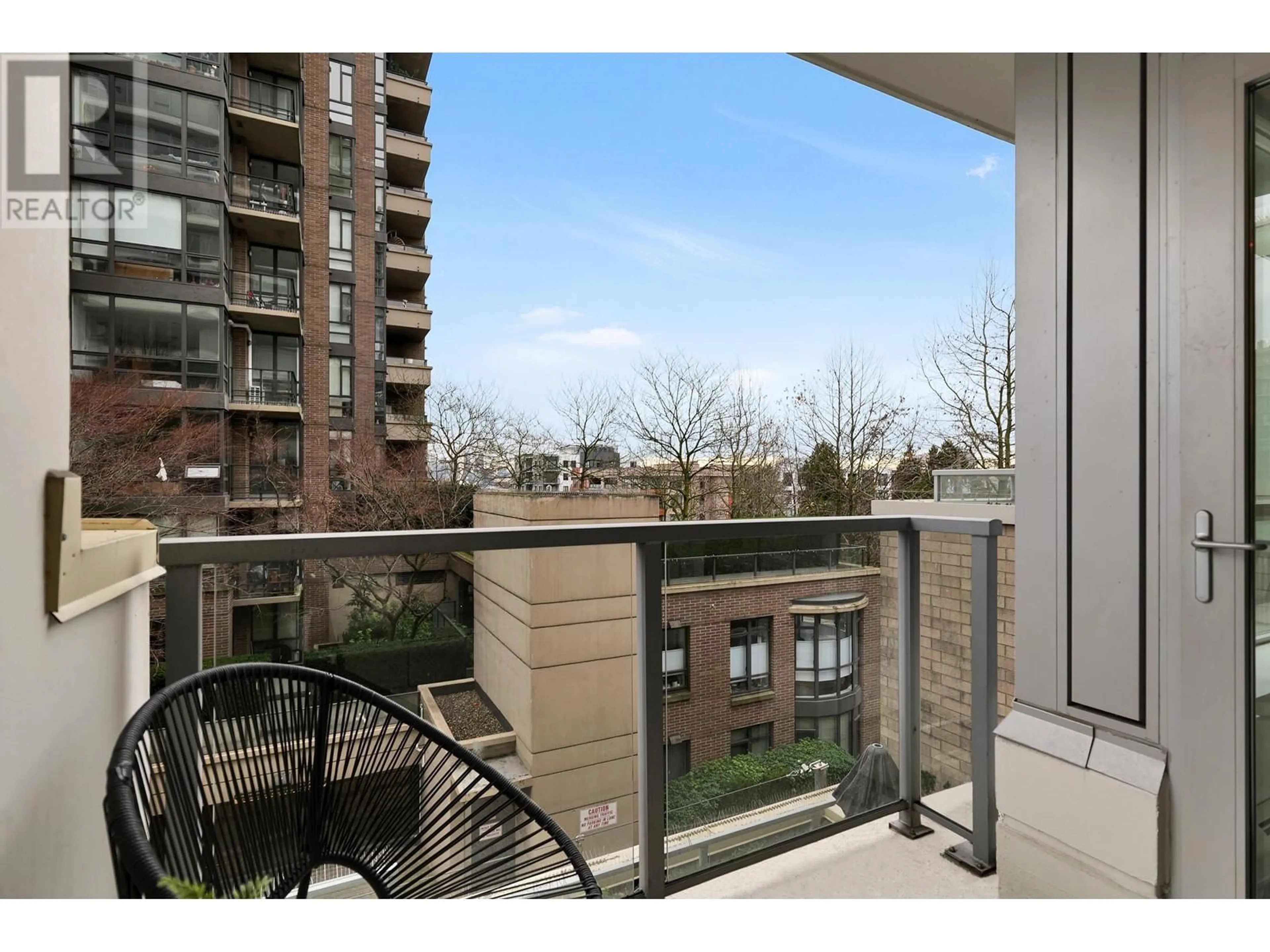 Balcony in the apartment, city buildings view from balcony for 203 - 175 2ND STREET, North Vancouver British Columbia V7M0A5