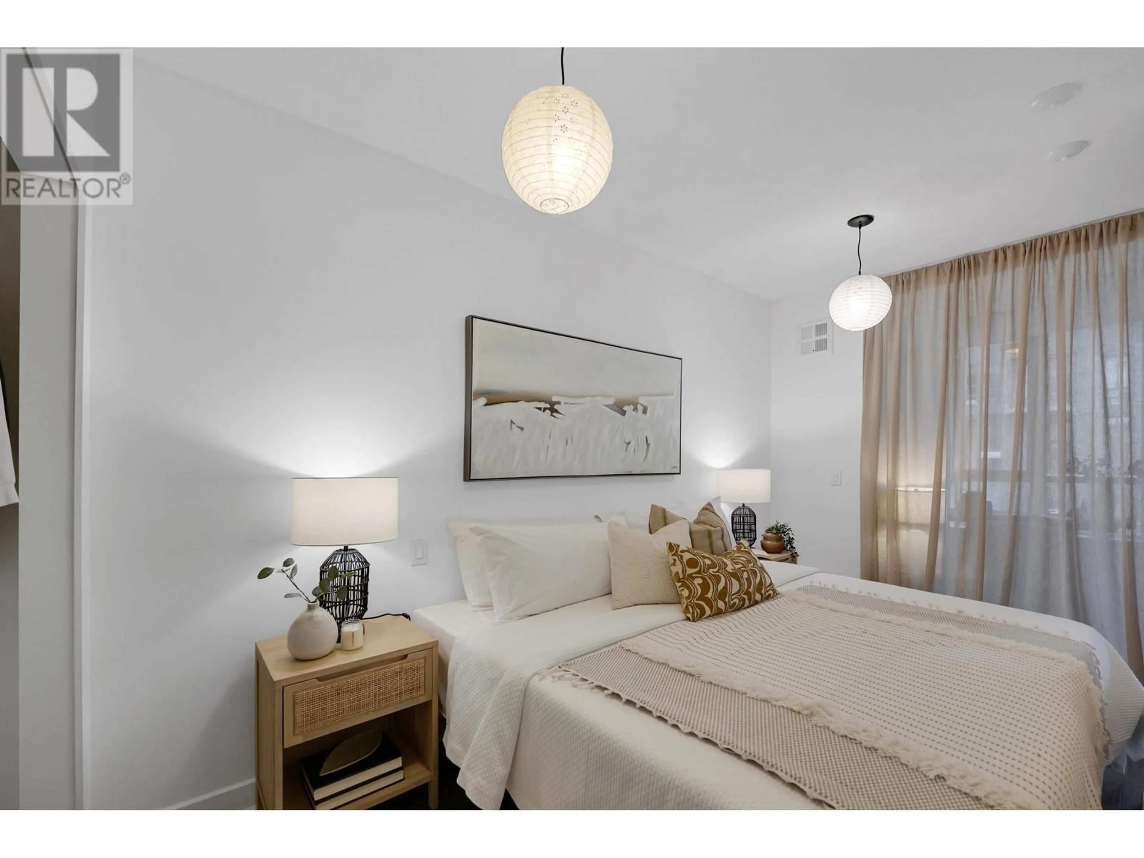 Bedroom with bed, unknown for 203 - 175 2ND STREET, North Vancouver British Columbia V7M0A5