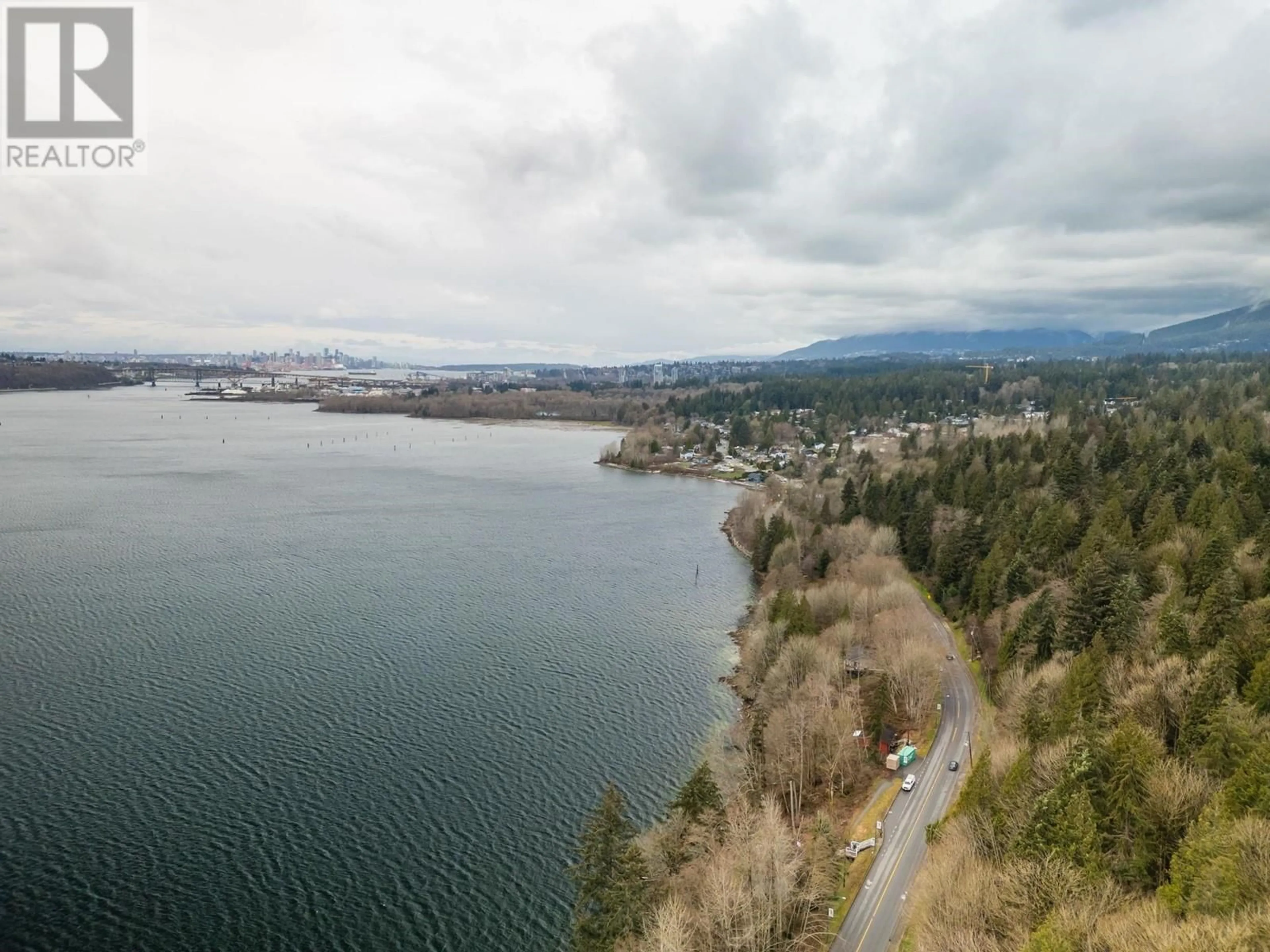 A pic from outside/outdoor area/front of a property/back of a property/a pic from drone, water/lake/river/ocean view for 501 - 560 RAVEN WOODS DRIVE, North Vancouver British Columbia V7G2T3