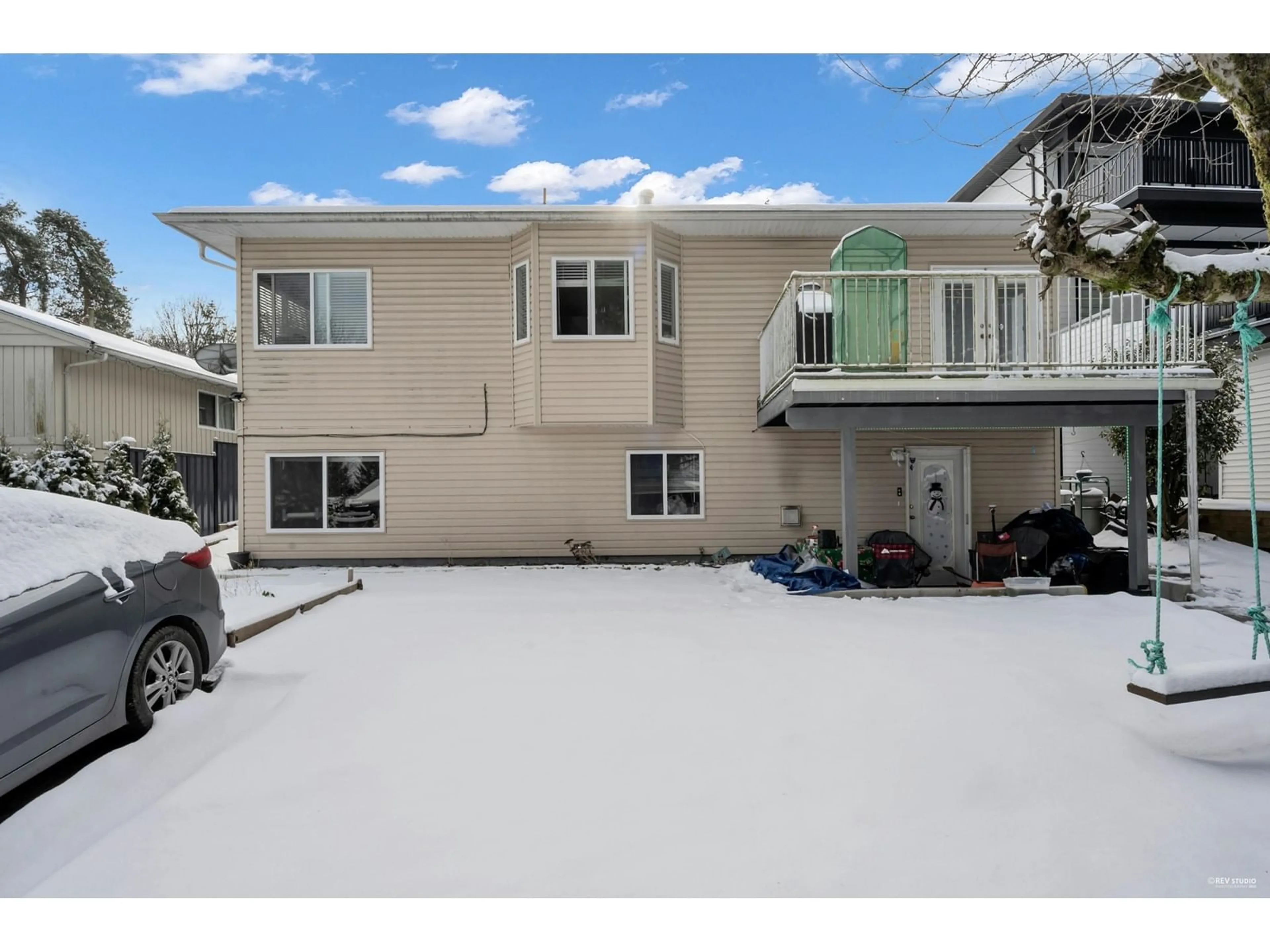 Home with vinyl exterior material, street for 14125 115, Surrey British Columbia V3R2P7