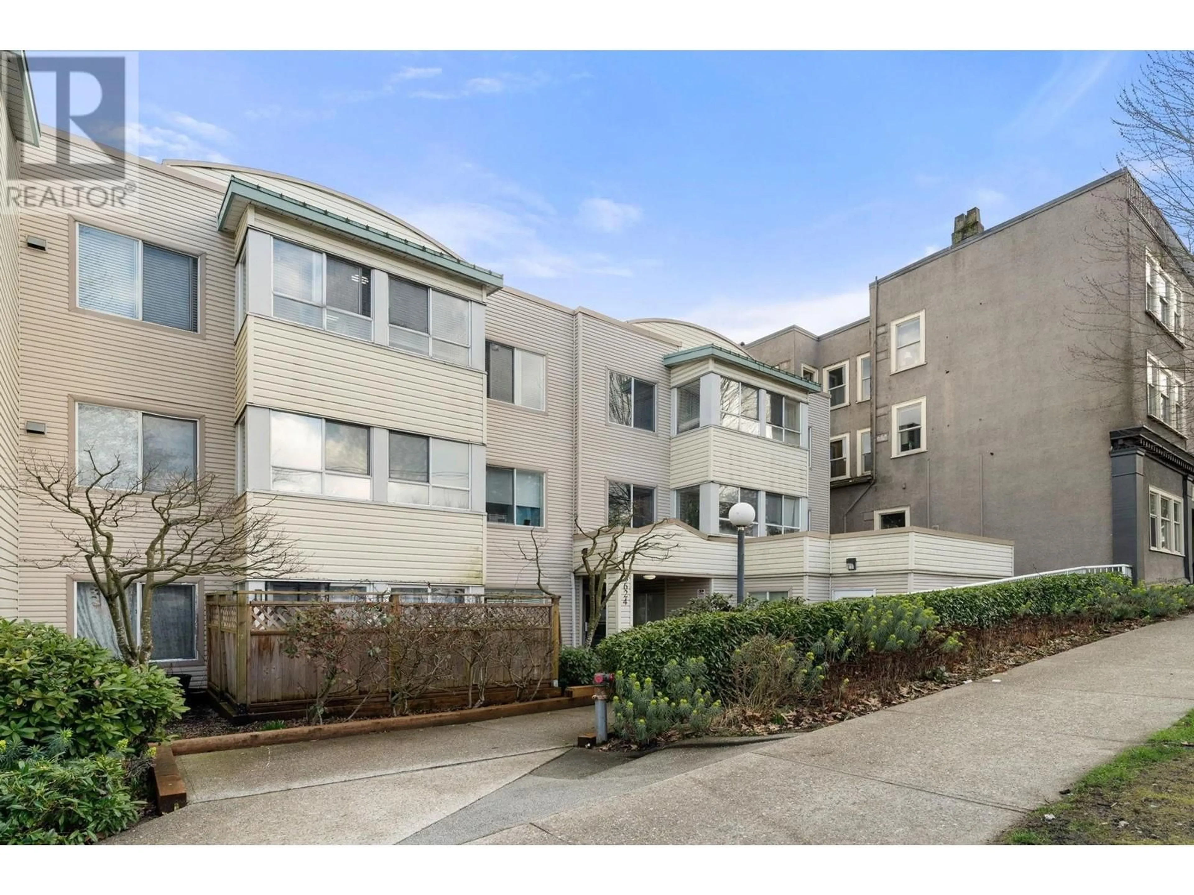 A pic from outside/outdoor area/front of a property/back of a property/a pic from drone, street for 306 - 3624 FRASER STREET, Vancouver British Columbia V5V4C8