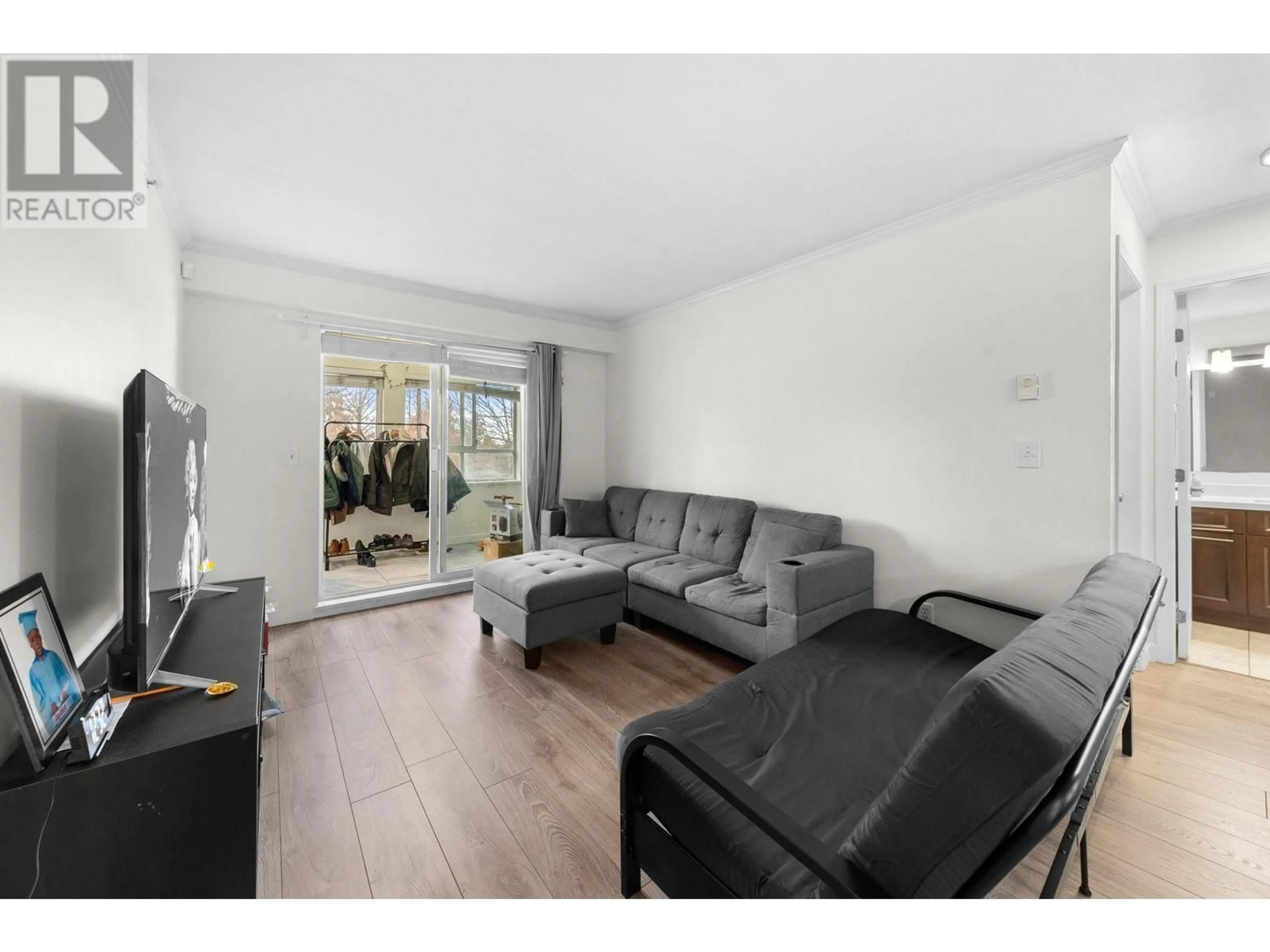 Living room with furniture, unknown for 306 - 3624 FRASER STREET, Vancouver British Columbia V5V4C8