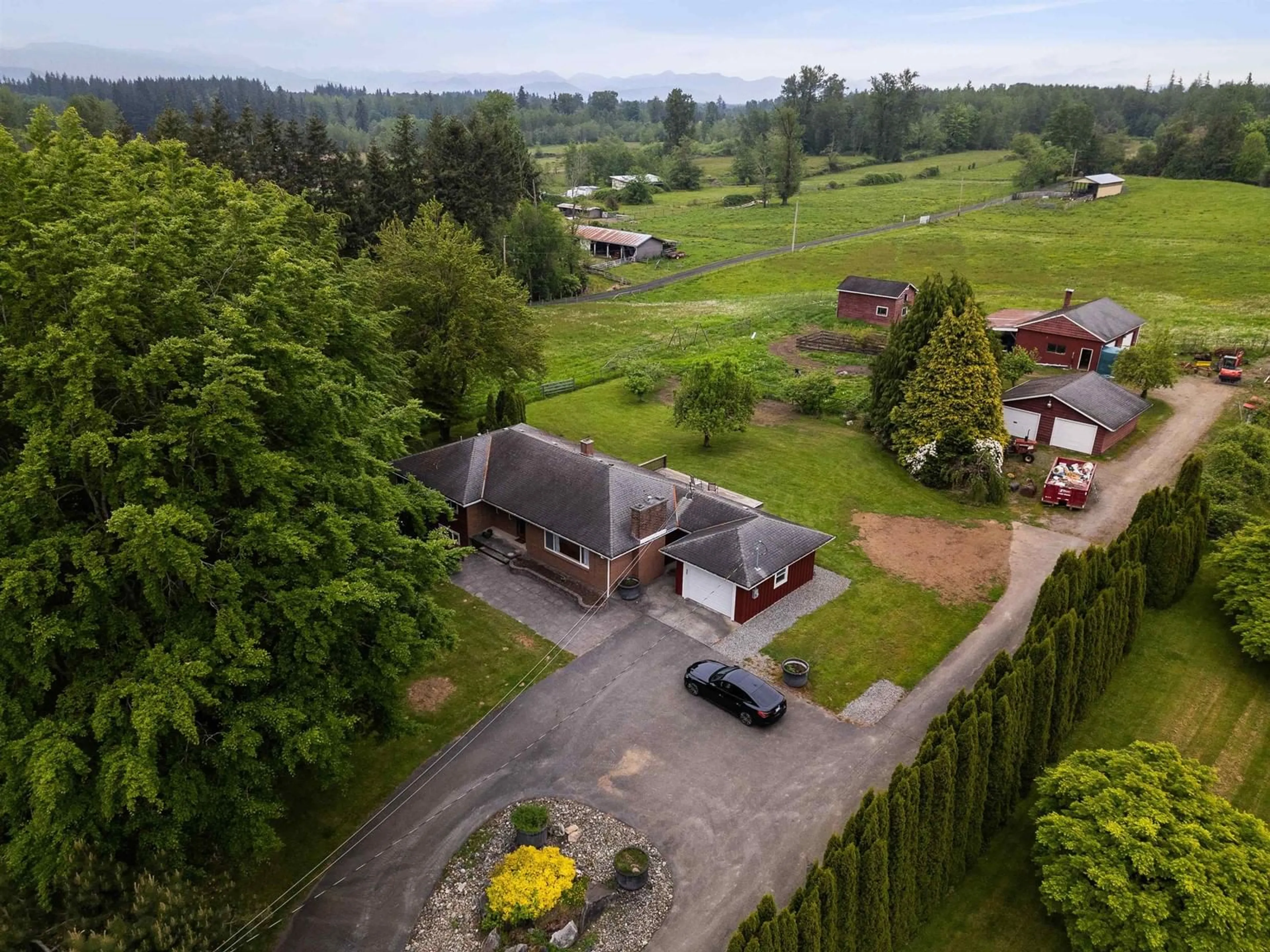 A pic from outside/outdoor area/front of a property/back of a property/a pic from drone, unknown for 2826 240, Langley British Columbia V2Z1N3