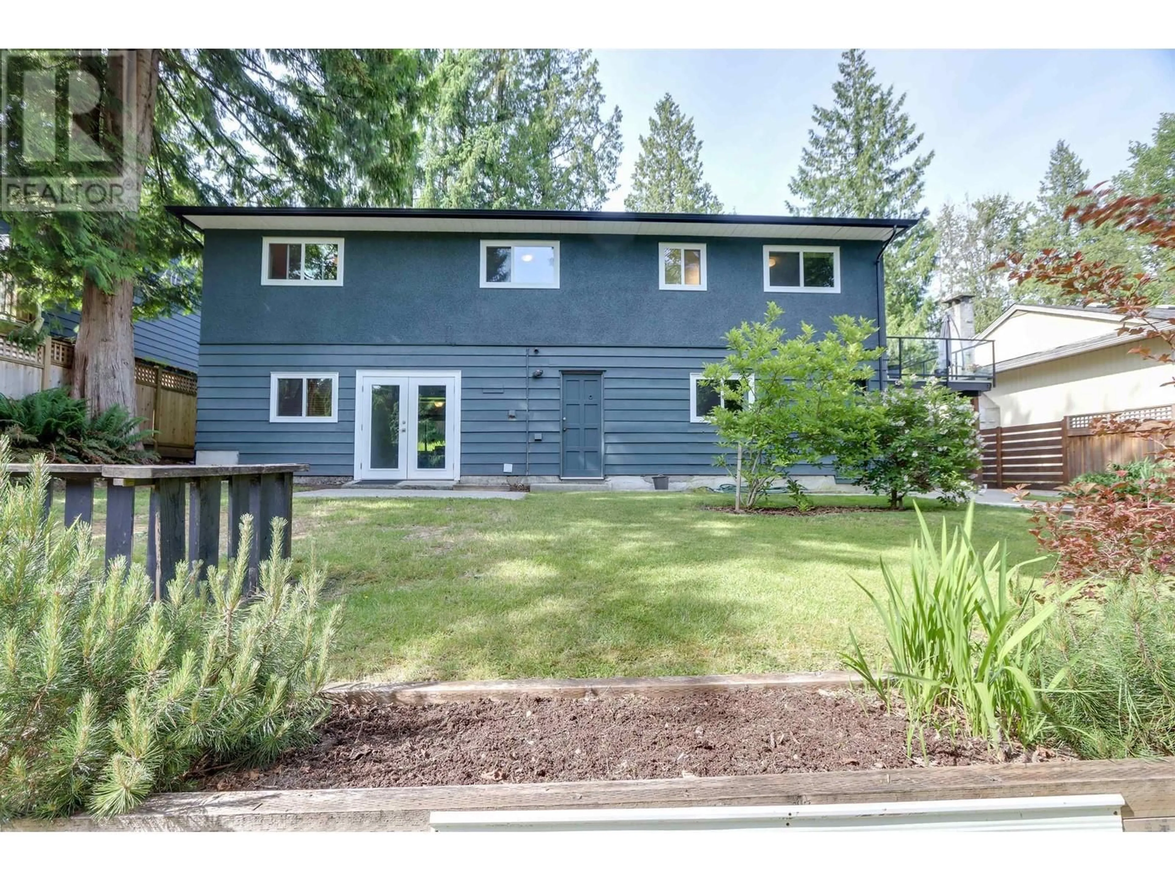 Home with vinyl exterior material, street for 999 FREDERICK ROAD, North Vancouver British Columbia V7K1H7