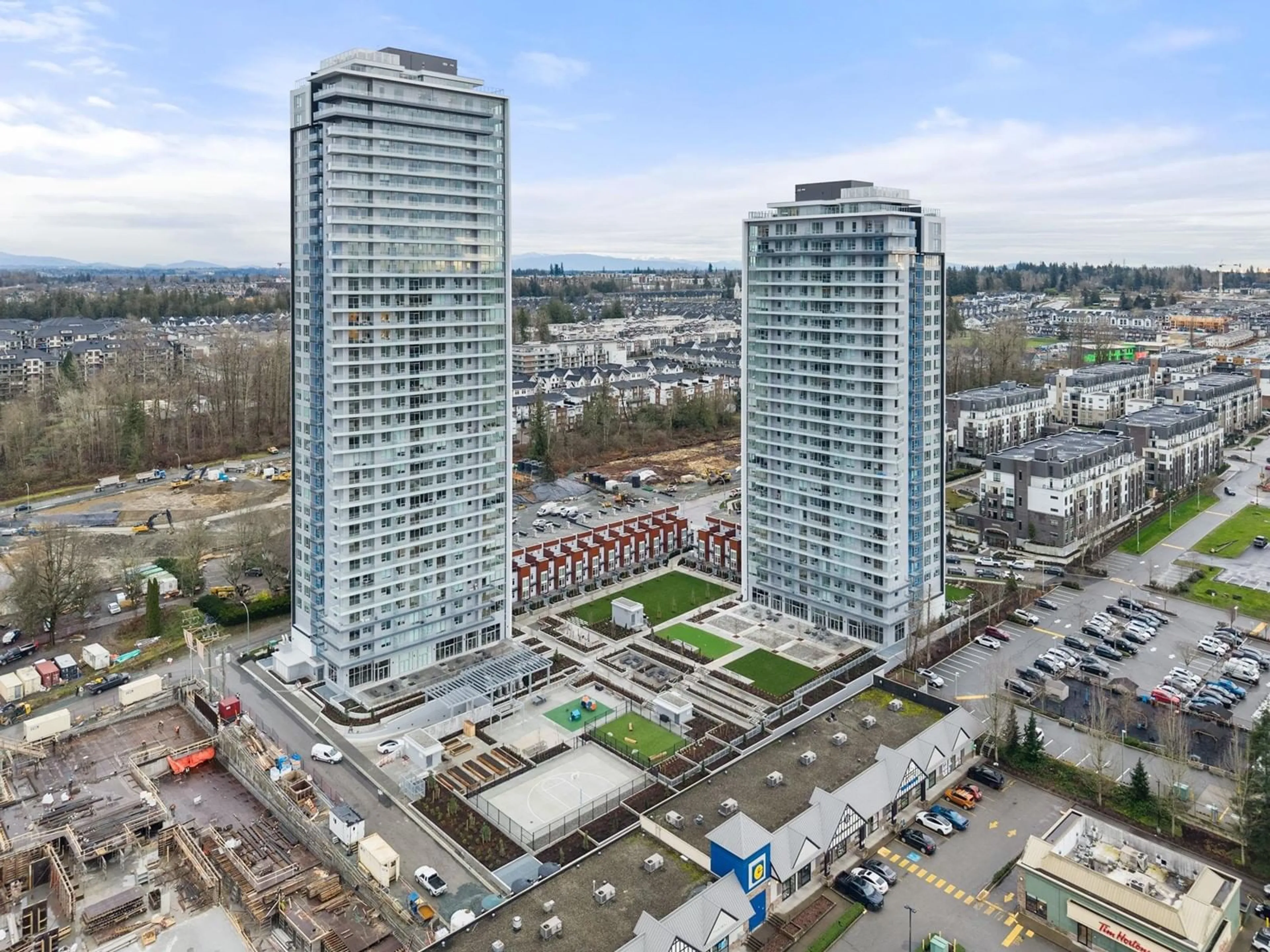 A pic from outside/outdoor area/front of a property/back of a property/a pic from drone, city buildings view from balcony for 3302 - 8551 201, Langley British Columbia V2Y3Y5