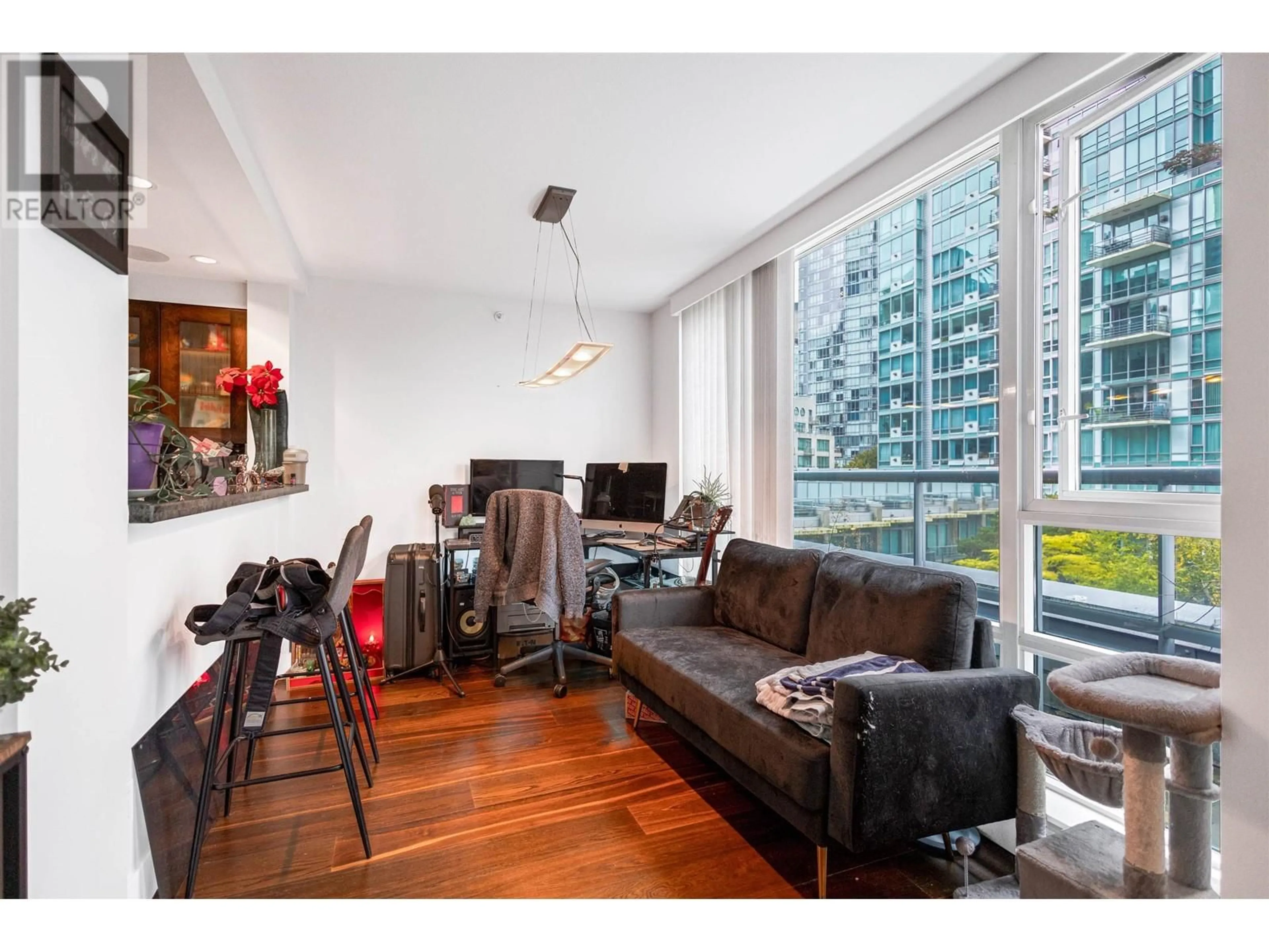 Living room with furniture, wood/laminate floor for 407 - 499 BROUGHTON STREET, Vancouver British Columbia V6G3K1