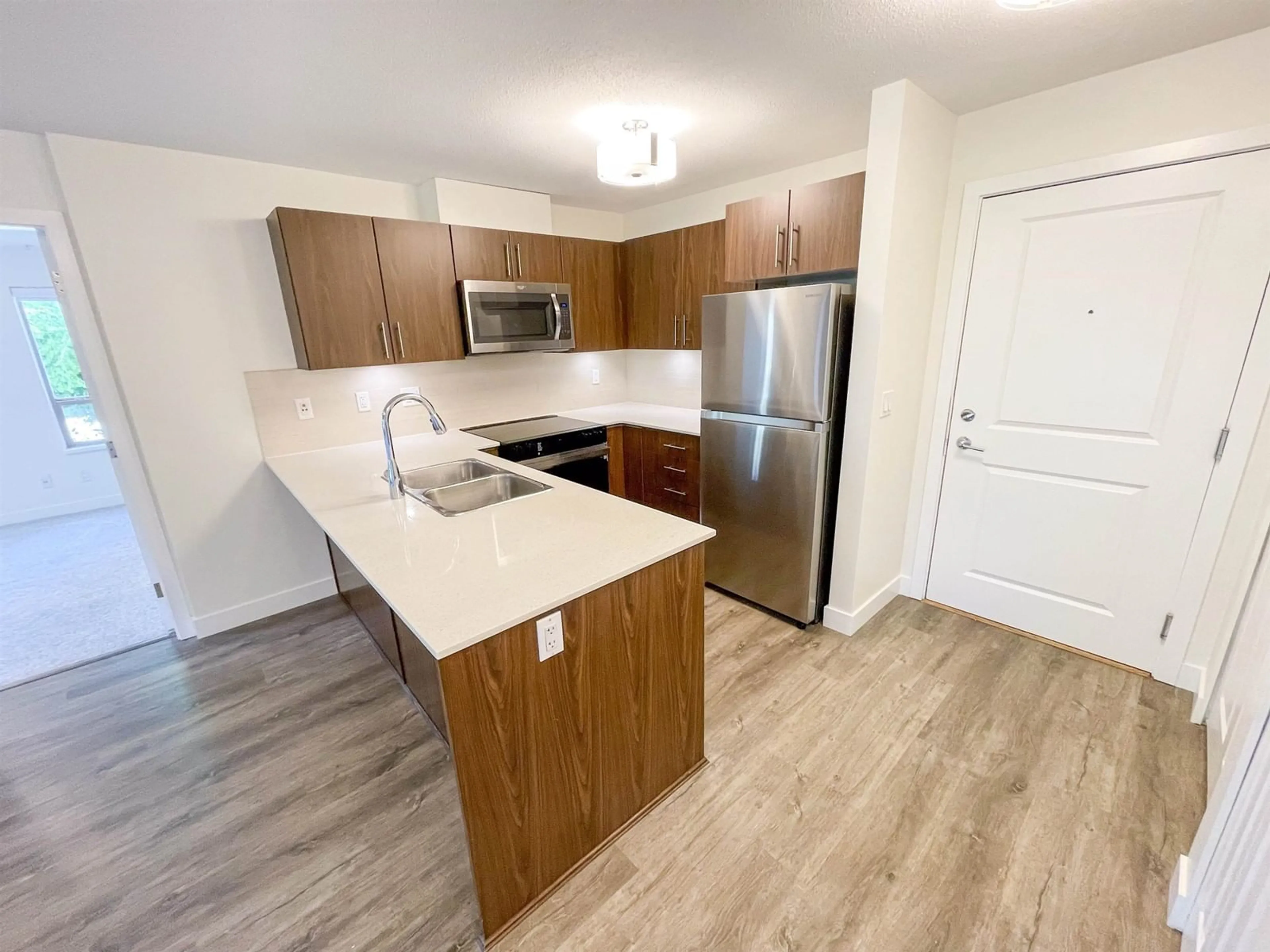 Standard kitchen, wood/laminate floor for 207 - 8915 202, Langley British Columbia V1M0B5